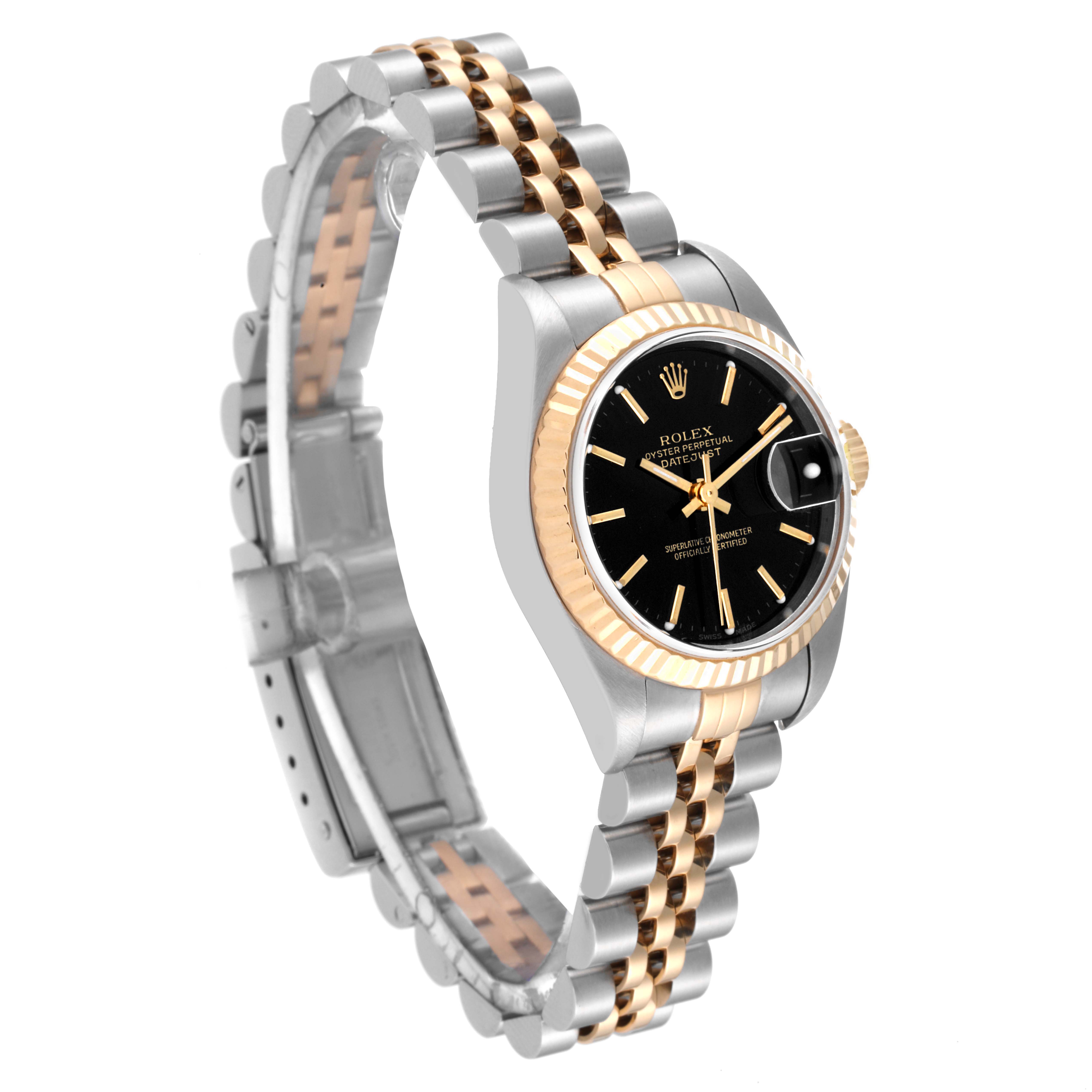 This image shows a Rolex Datejust 79173 Women's Steel and Gold (two tone) Black Dial 79173 Women's Steel and Gold (two tone) Black Dial watch at a three-quarter angle, highlighting its dial, bezel, and bracelet.