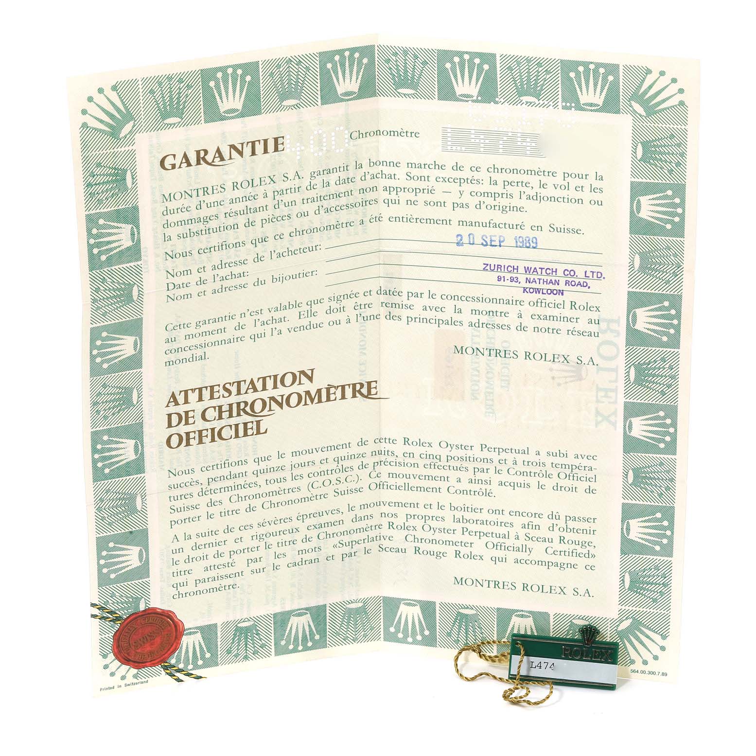 The image shows the warranty certificate and chronometer certification paper, along with a tag and seal for a Rolex Datejust 69173 Women's Steel and Gold (two tone) Champagne Dial 69173 Women's Steel and Gold (two tone) Champagne Dial watch.