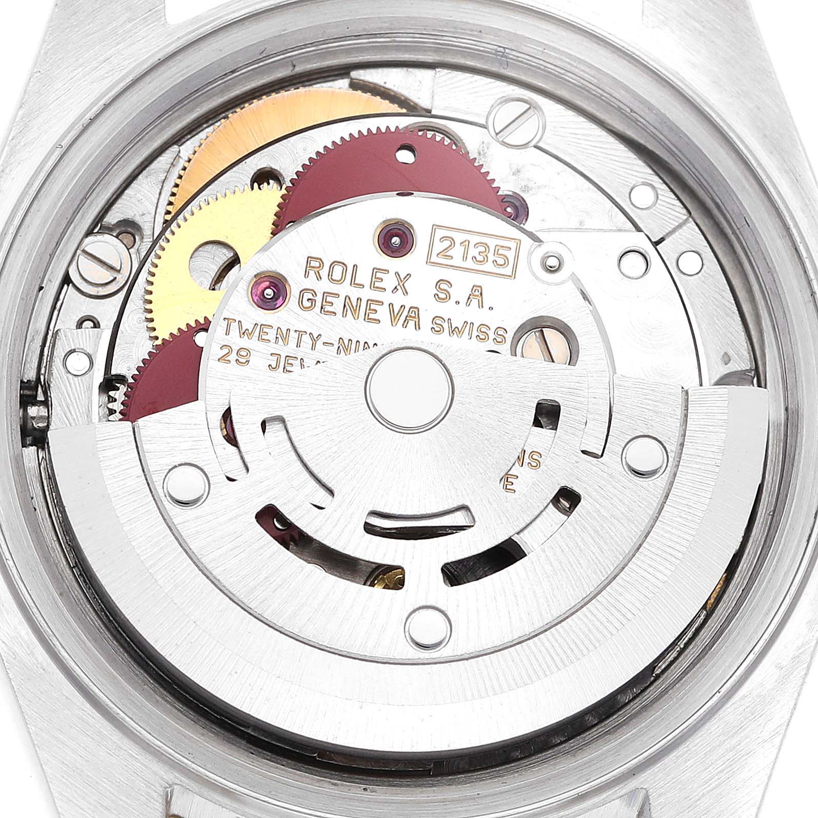 The image shows the internal movement of the Rolex Datejust 69173 Women's Steel and Gold (two tone) Champagne Dial 69173 Women's Steel and Gold (two tone) Champagne Dial watch viewed from the back, highlighting its intricate gears and mechanisms.