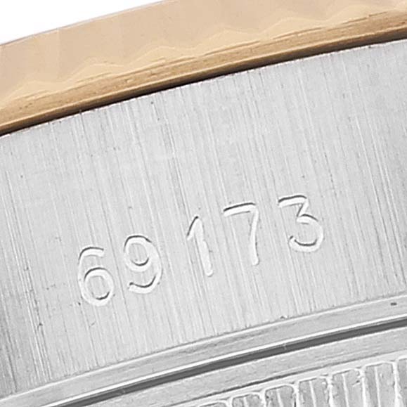 This image shows a close-up of the model number "69173" on the side of the case of a Rolex Datejust 69173 Women's Steel and Gold (two tone) Champagne Dial 69173 Women's Steel and Gold (two tone) Champagne Dial watch.