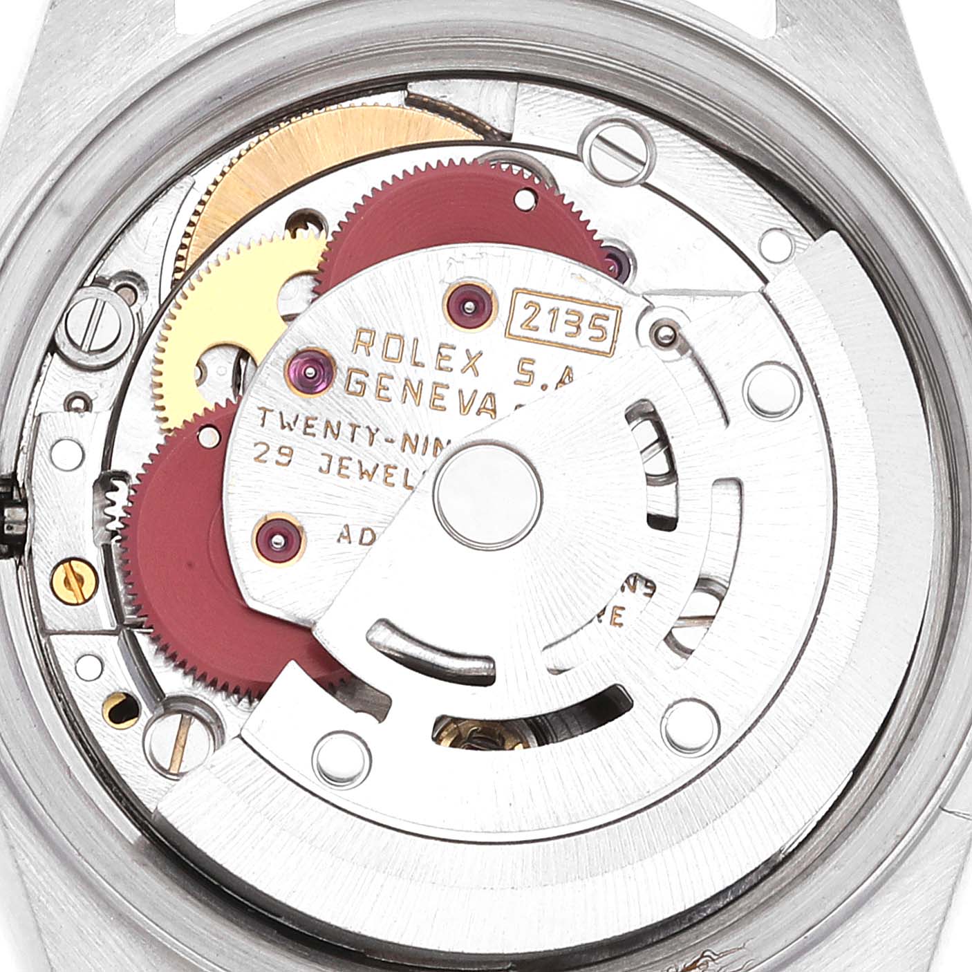This image shows the internal mechanism of a Rolex Datejust 69173 Women's Steel and Gold (two tone) Champagne Dial 69173 Women's Steel and Gold (two tone) Champagne Dial watch at a close-up angle, highlighting gears and the rotor.