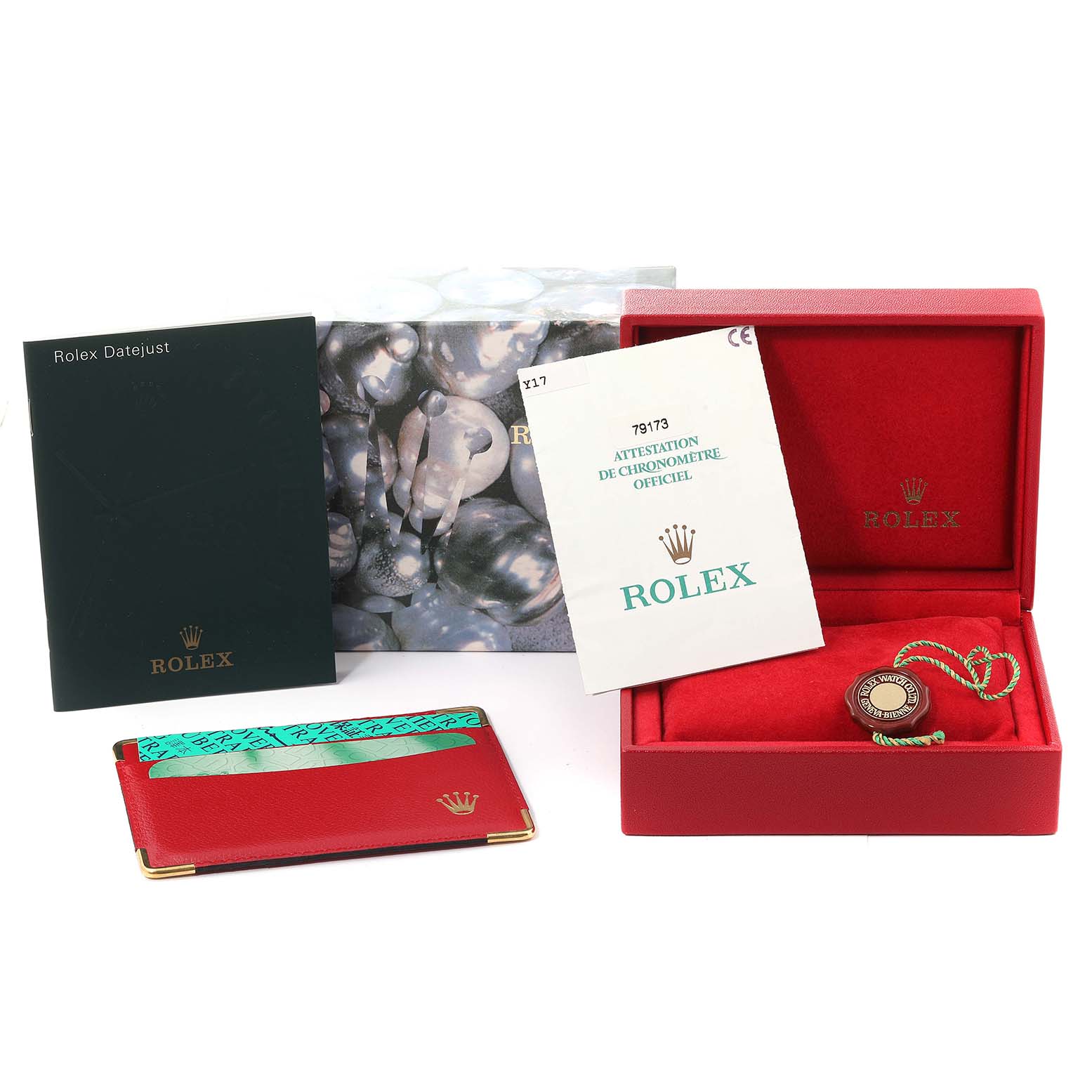 The image displays a Rolex Datejust 79173 Women's Steel and Gold (two tone) Mother of Pearl Dial 79173 Women's Steel and Gold (two tone) Mother of Pearl Dial watch box, certification, booklet, cardholder, and tag from a frontal angle.