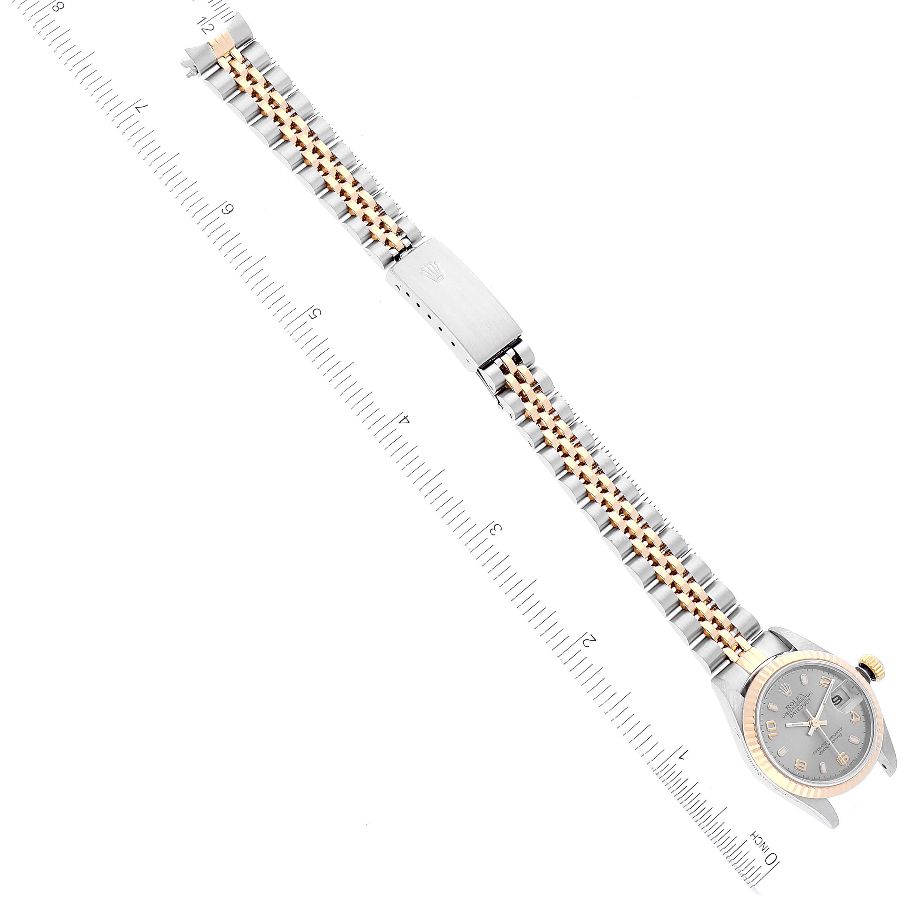 The image shows a Rolex Datejust 79173 Women's Steel and Gold (two tone) Grey Dial 79173 Women's Steel and Gold (two tone) Grey Dial watch from a top-down angle, displaying the bracelet, clasp, and watch face.