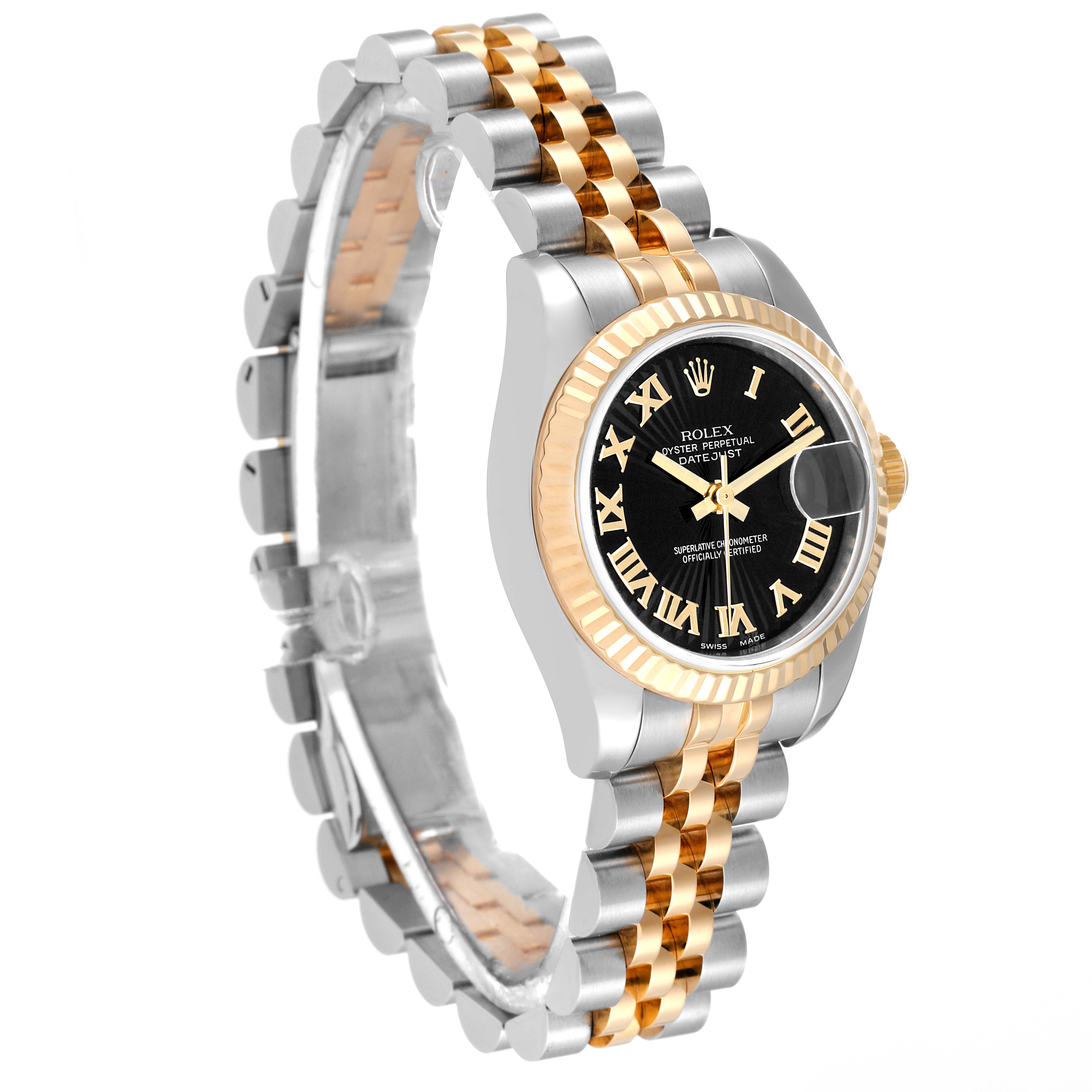 The image shows a Rolex Datejust 179173 Women's Steel and Gold (two tone) Black Dial 179173 Women's Steel and Gold (two tone) Black Dial watch at an angle highlighting its black dial, gold fluted bezel, and two-tone bracelet.