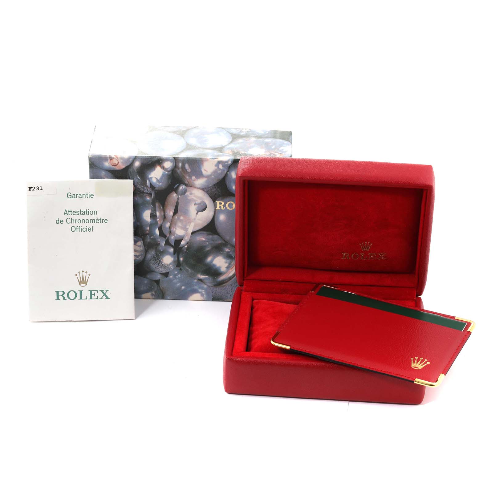The image shows the box, warranty booklet, and cardholder for the Rolex Datejust 79173 Women's Steel and Gold (two tone) White Dial 79173 Women's Steel and Gold (two tone) White Dial model.