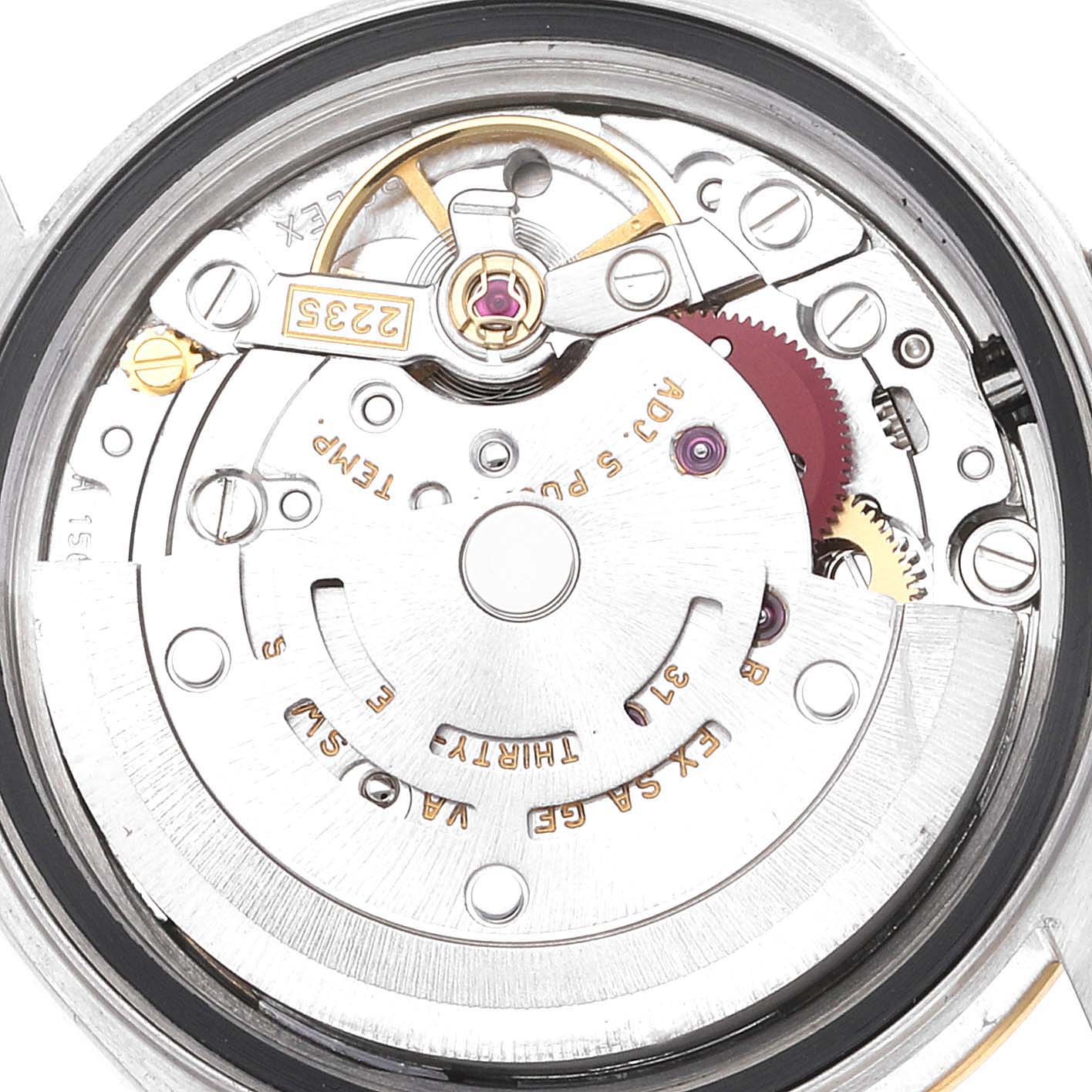 This is an internal view of the Rolex Datejust 79173 Women's Steel and Gold (two tone) White Dial 79173 Women's Steel and Gold (two tone) White Dial watch, showcasing its intricate movement components.