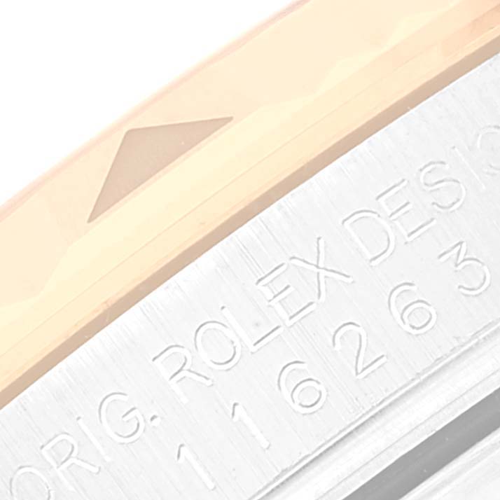 The image shows a close-up angle featuring the bezel and engraving of the Rolex Turn-o-Graph 116263 Men's Steel and Gold (two tone) White Dial 116263 Men's Steel and Gold (two tone) White Dial watch.