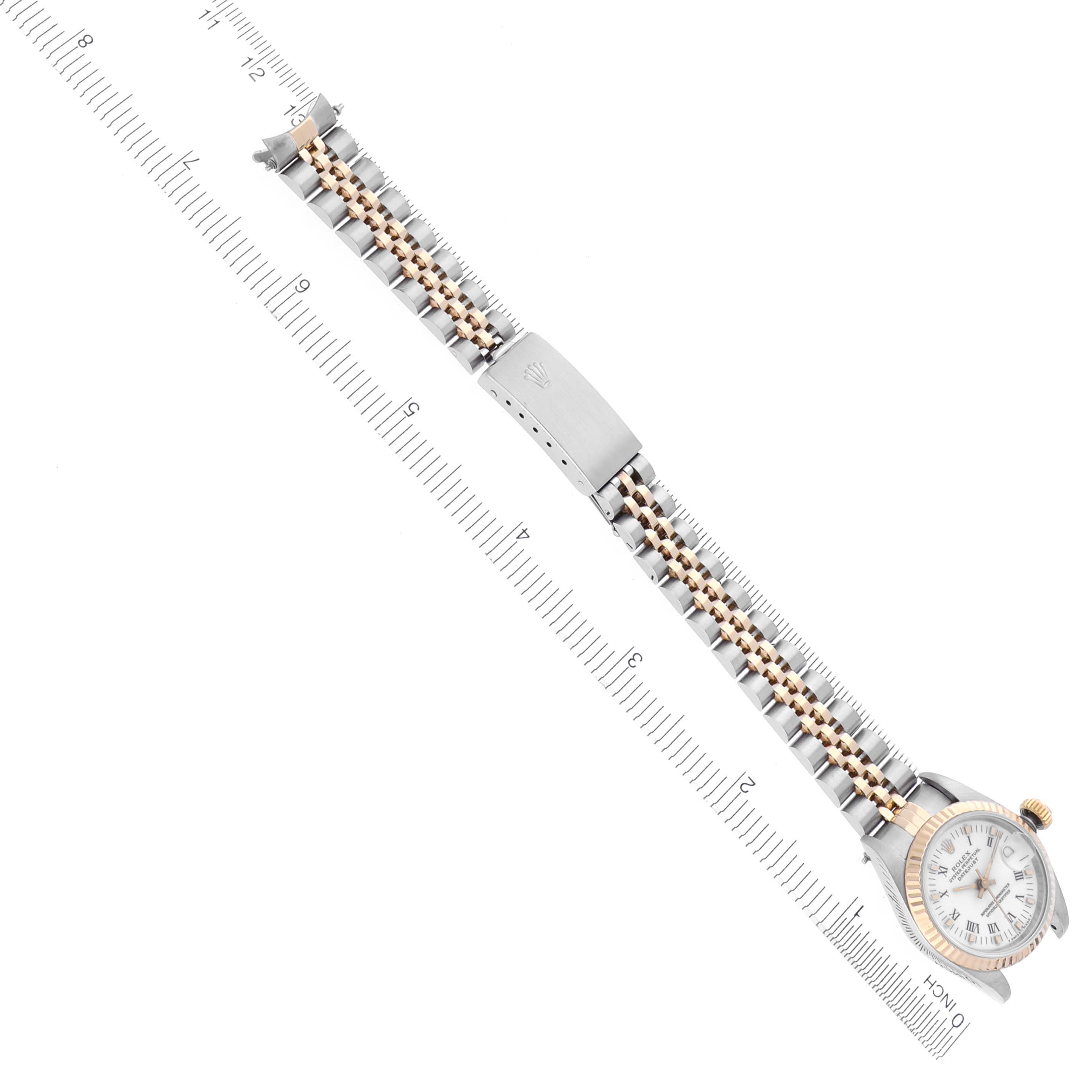 The image shows the Rolex Datejust 69173 Women's Steel and Gold (two tone) White Dial 69173 Women's Steel and Gold (two tone) White Dial watch from a top view, highlighting the two-tone bracelet, clasp, and watch face.