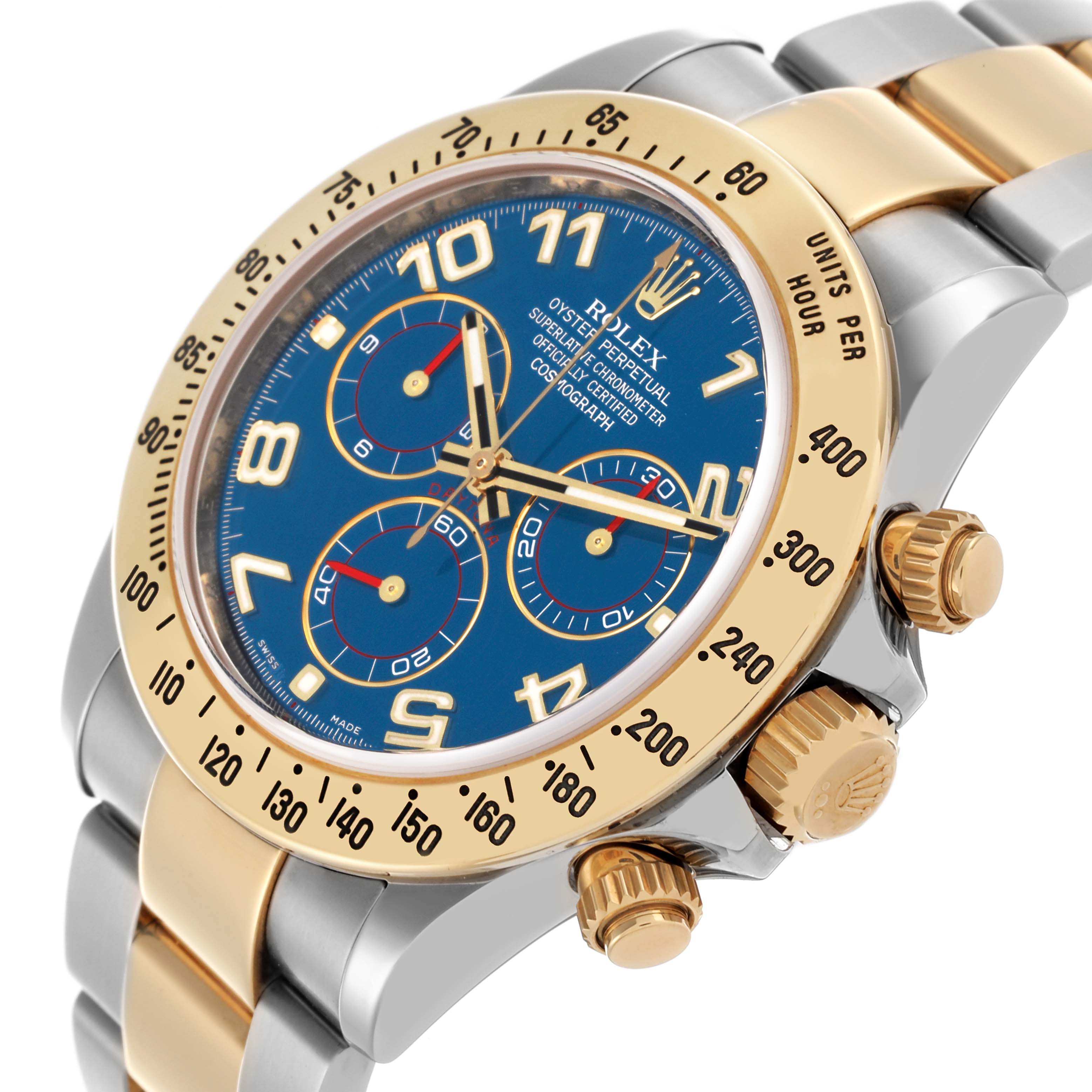 The Rolex Daytona 116523 Men's Steel and Gold (two tone) Blue Dial 116523 Men's Steel and Gold (two tone) Blue Dial is shown at an angled side view, highlighting the dial, bezel, crown, and pushers.