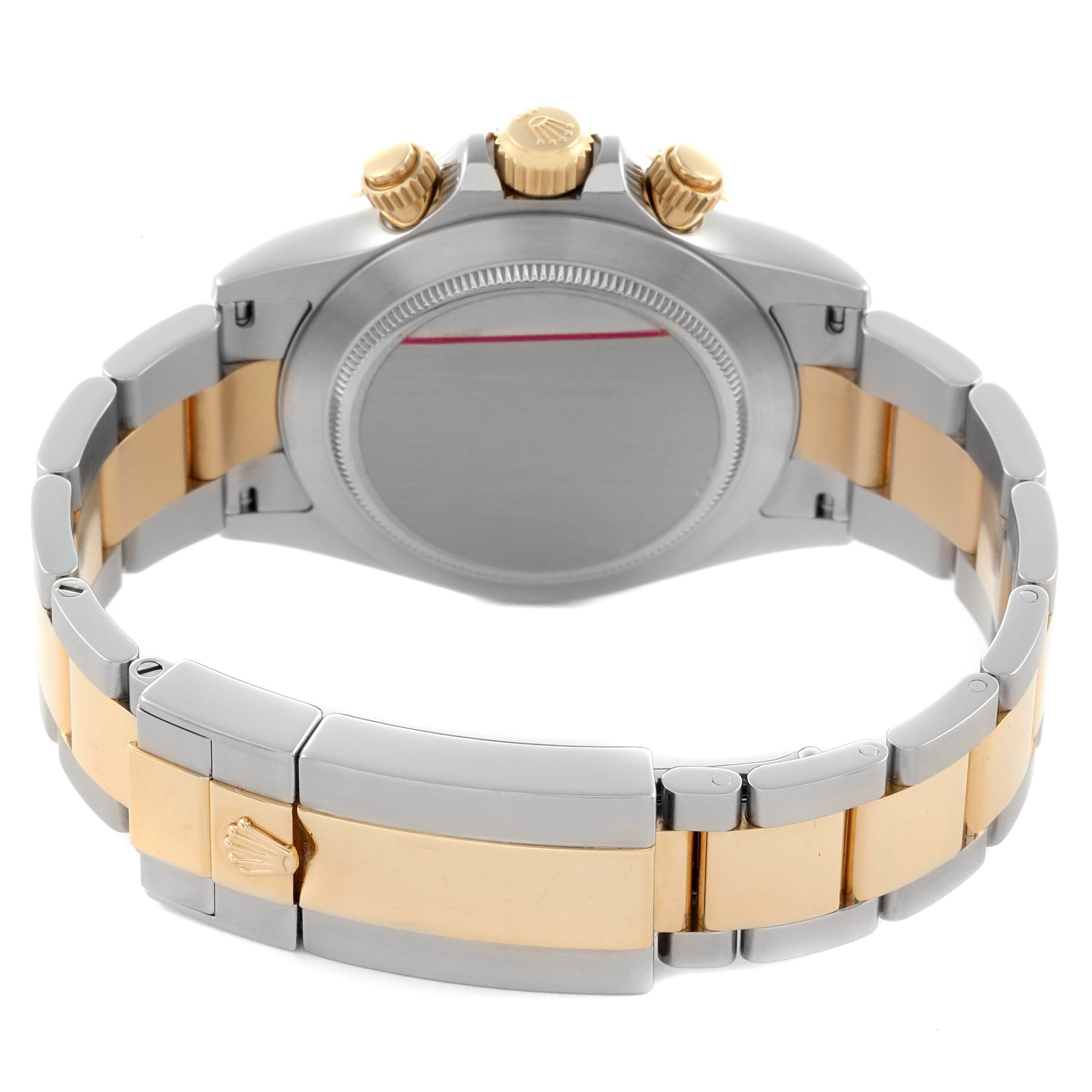 The image shows the back view of a Rolex Daytona 116523 Men's Steel and Gold (two tone) Blue Dial 116523 Men's Steel and Gold (two tone) Blue Dial watch, highlighting the bracelet and clasp.