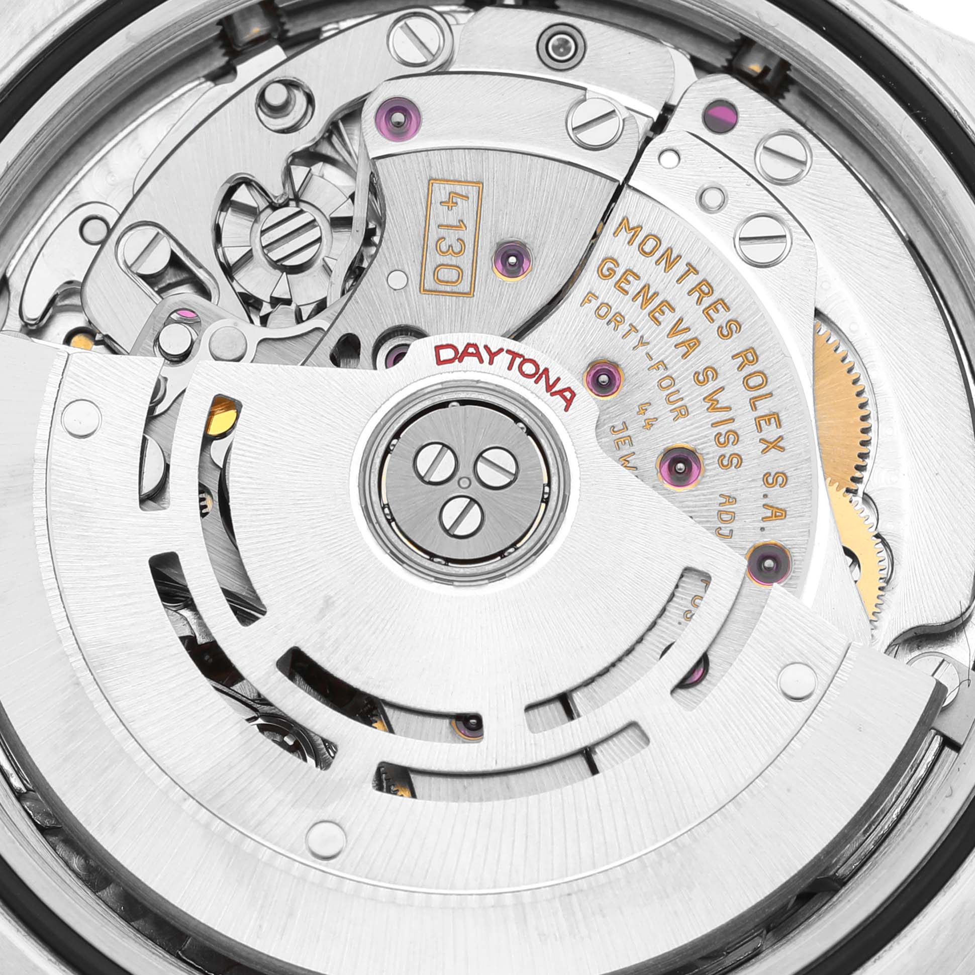 This image shows the internal movement mechanism of a Rolex Daytona 116523 Men's Steel and Gold (two tone) White Dial 116523 Men's Steel and Gold (two tone) White Dial watch, highlighting the intricate gears and components.