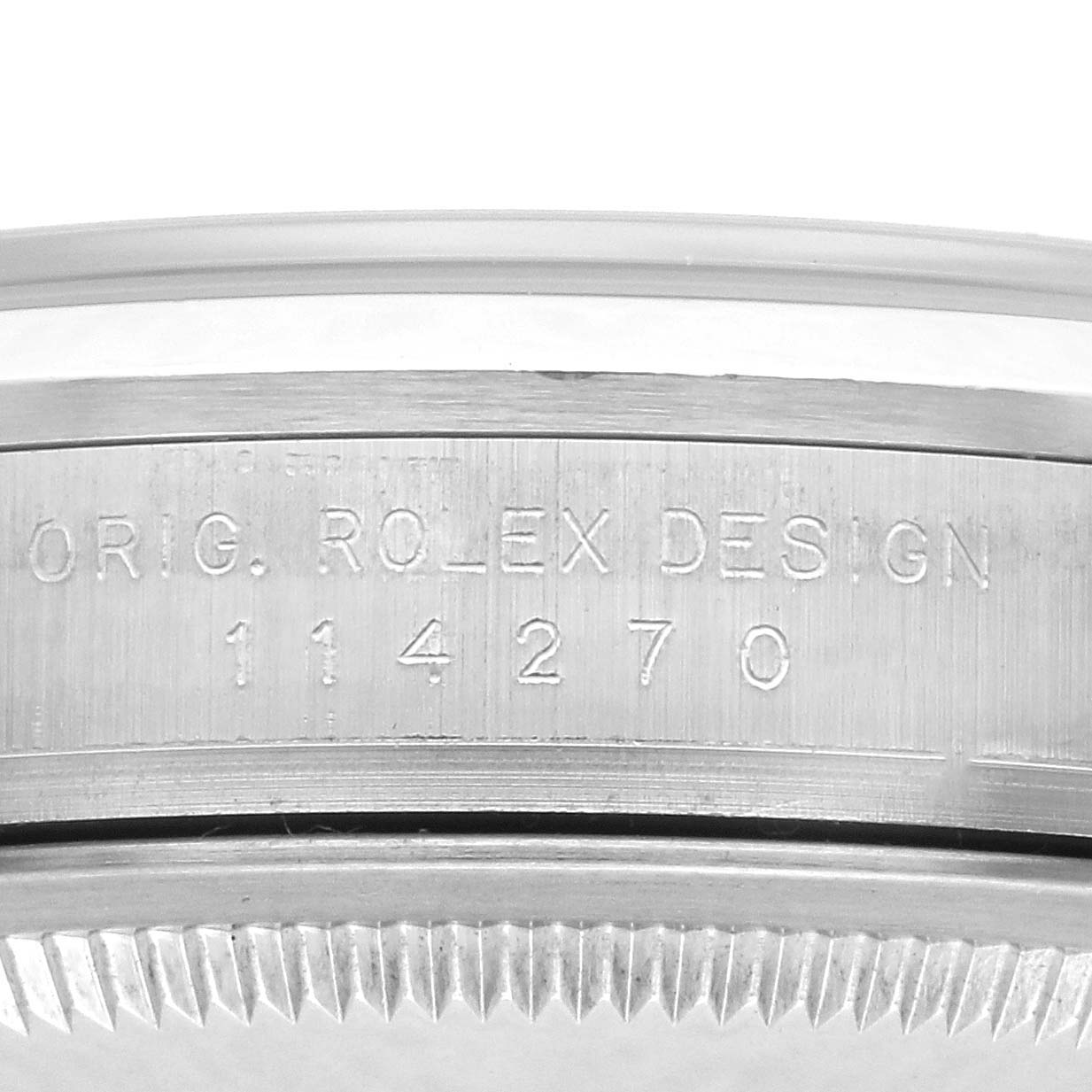 The image shows the side engraving on the bezel of a Rolex Explorer 114270 Men's Stainless Steel Black Dial 114270 Men's Stainless Steel Black Dial model, highlighting the design number.