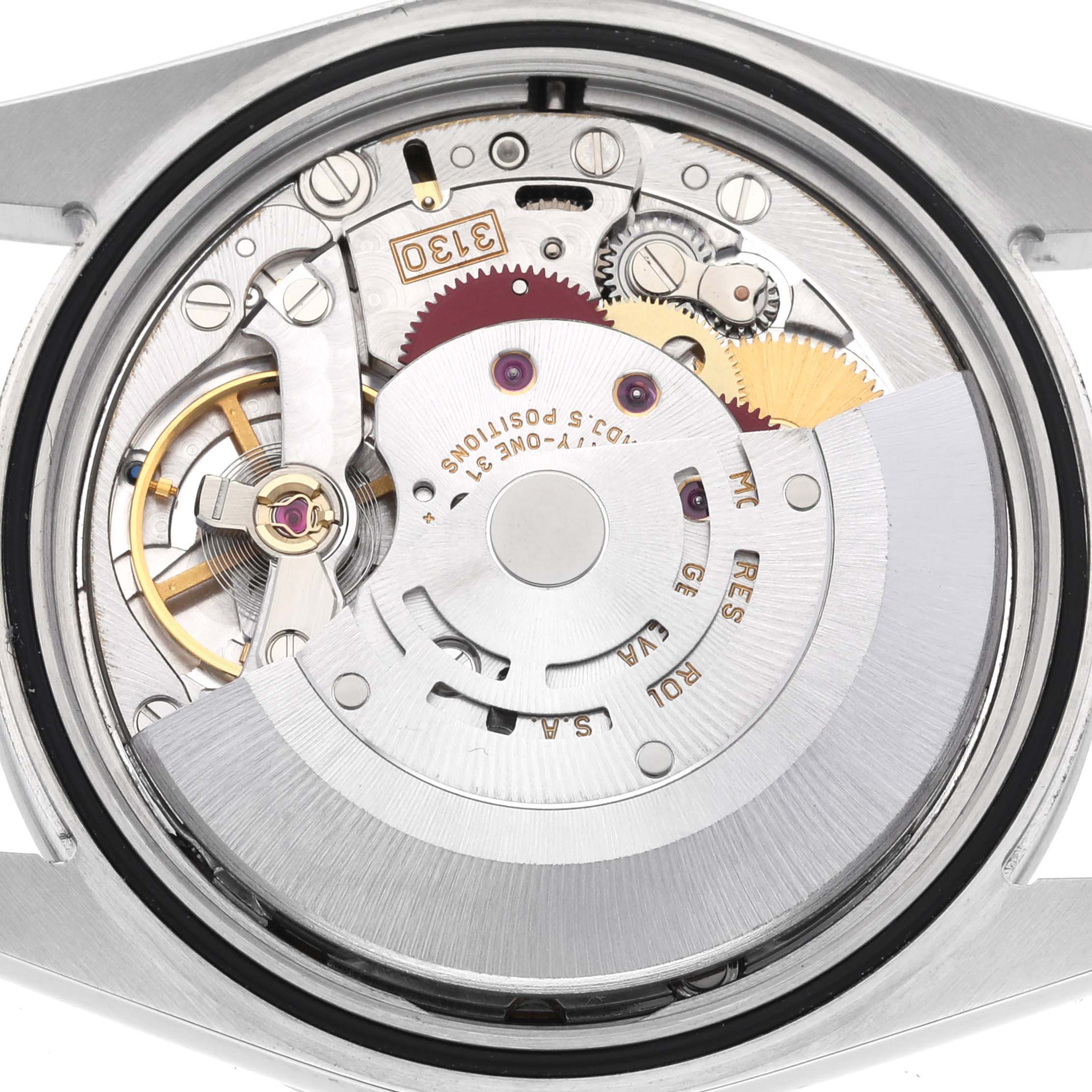 The image shows the rear view of the Rolex Explorer 114270 Men
s Stainless Steel Black Dial 114270 Men
s Stainless Steel Black Dial
s movement, displaying its intricate internal components.