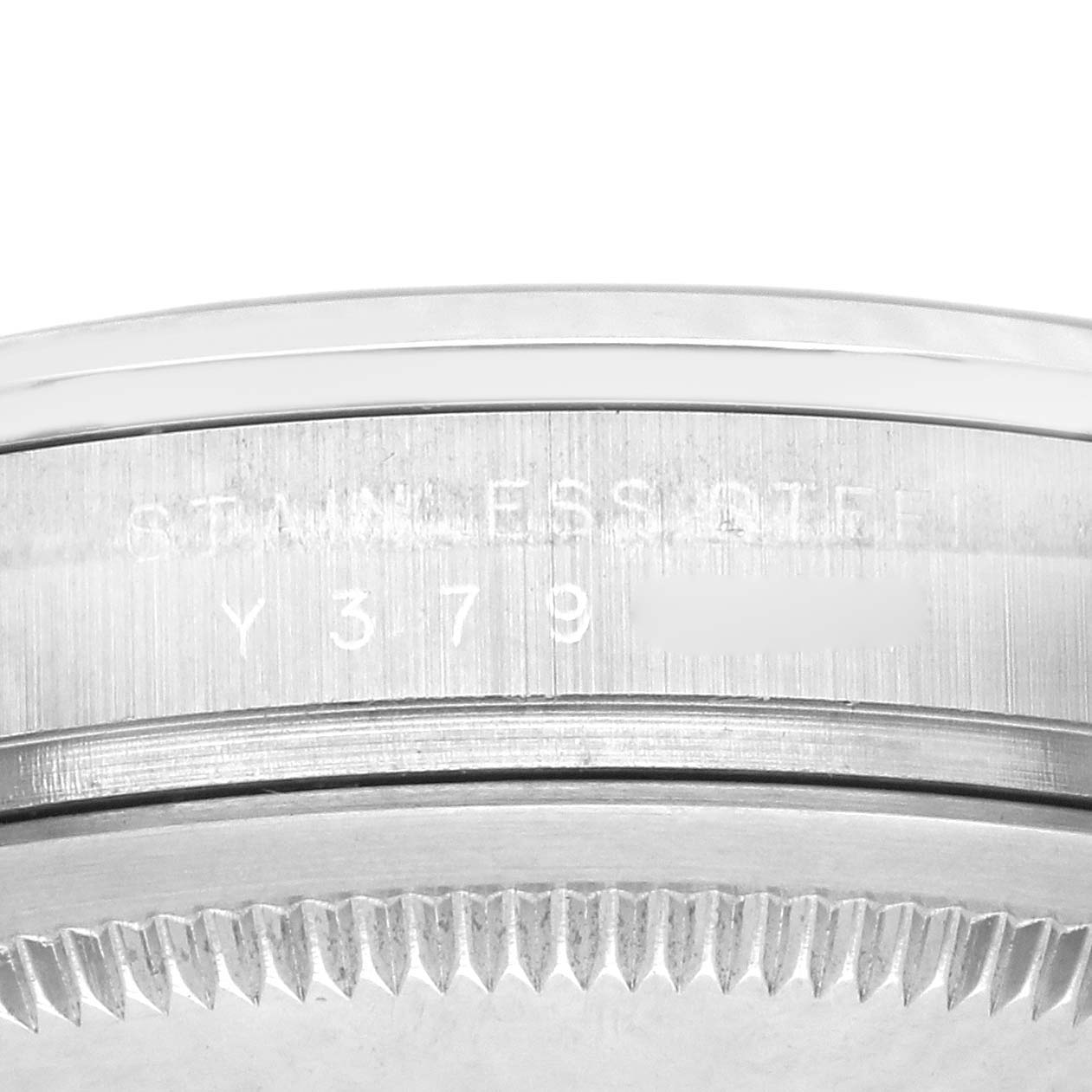 The image shows a close-up of the side of a Rolex Explorer 114270 Men
s Stainless Steel Black Dial 114270 Men
s Stainless Steel Black Dial watch, highlighting the serial engraving on the case edge.