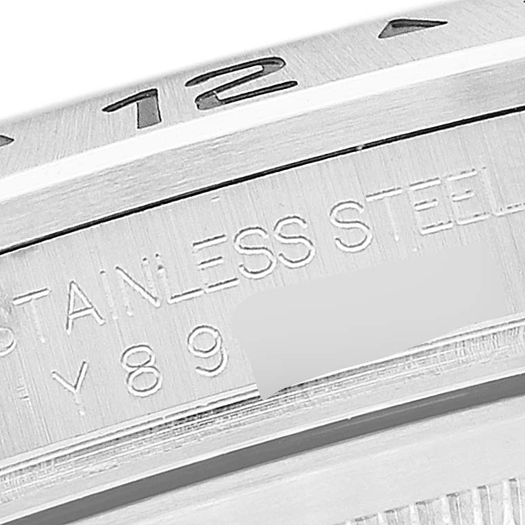 The image shows a close-up of the side engraving and partial bezel of a Rolex Explorer 16570 Men's Stainless Steel Black Dial 16570 Men's Stainless Steel Black Dial watch.