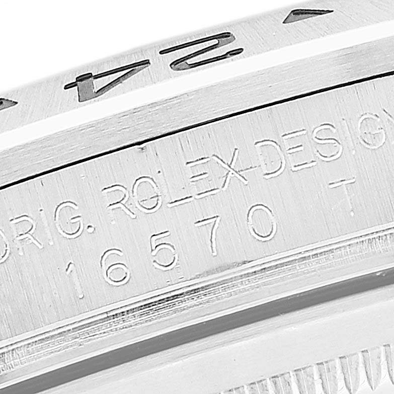 This close-up image shows the engraved bezel and side of a Rolex Explorer 16570 Men's Stainless Steel Black Dial 16570 Men's Stainless Steel Black Dial watch, model number 16570.