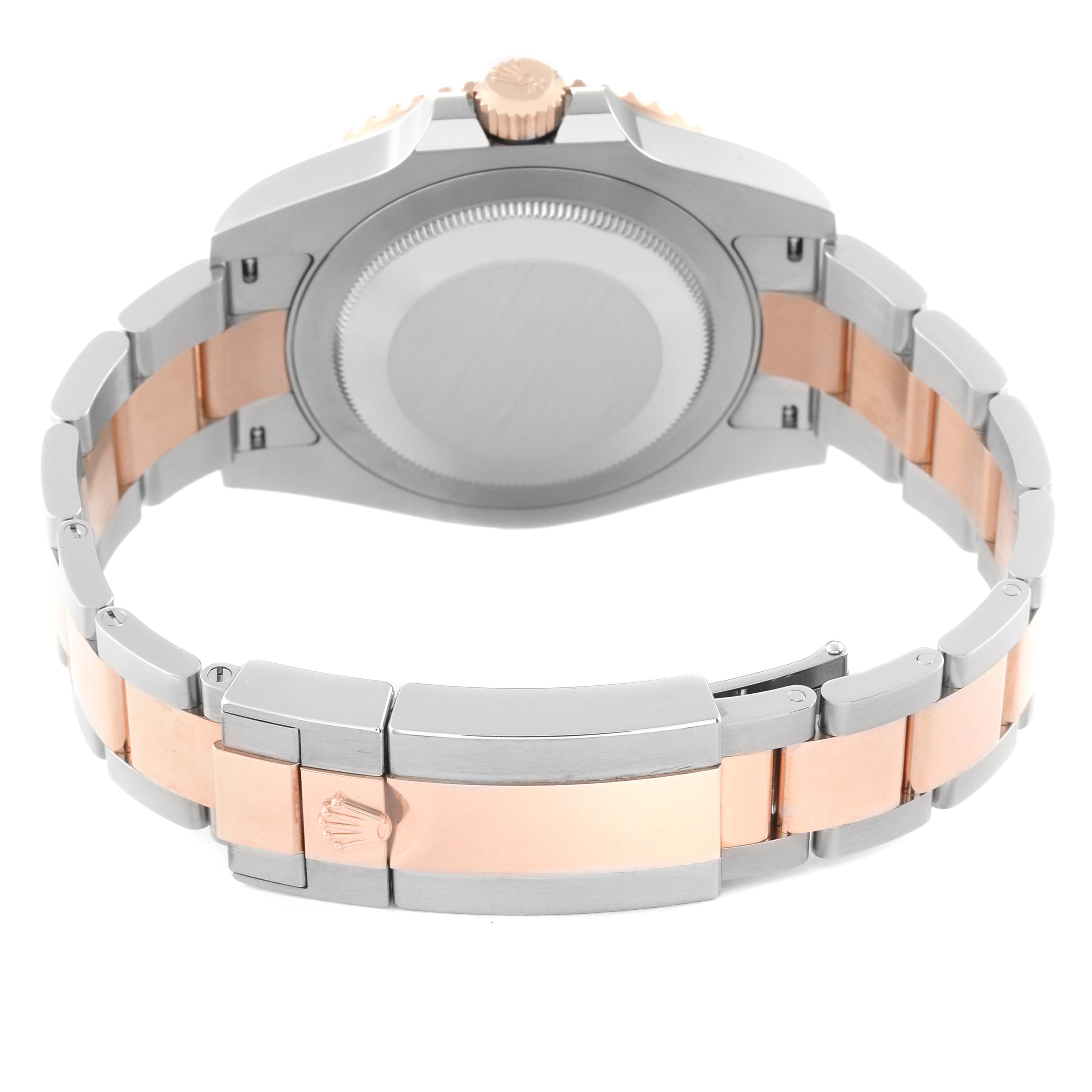 The image shows the back view of a Rolex GMT-Master 126711CHNR Men's Steel and Gold (two tone) Black Dial 126711CHNR Men's Steel and Gold (two tone) Black Dial watch, focusing on the case back and two-tone band.