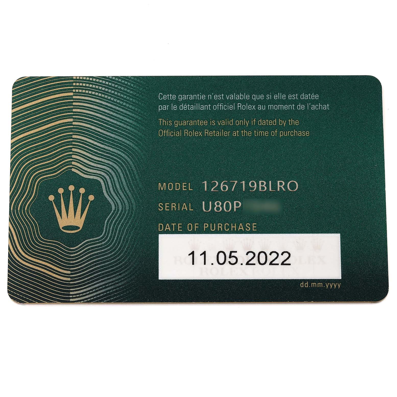 The image shows a warranty card for the Rolex GMT-Master 126719 Men's White Gold Blue Dial 126719 Men's White Gold Blue Dial model 126719BLRO, detailing the serial number and purchase date.