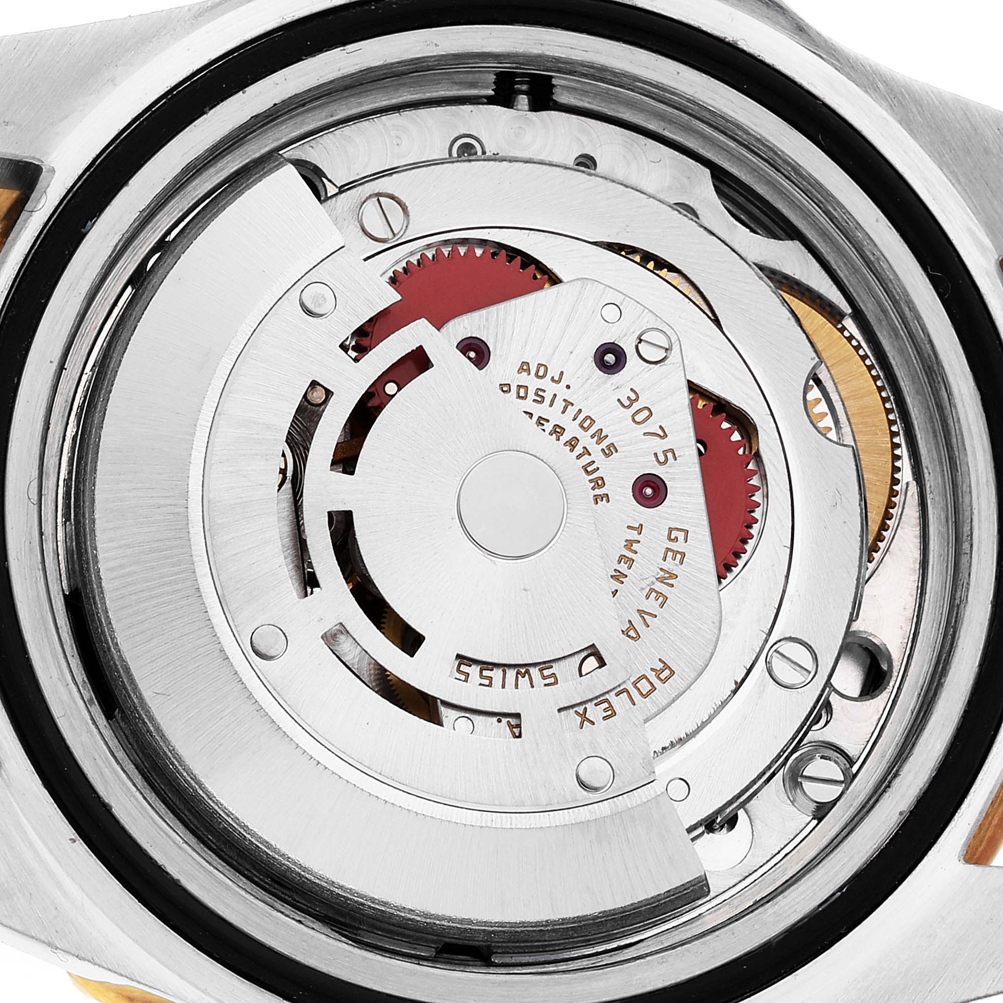 This image shows the inner mechanical movement of a Rolex GMT-Master 16753 Men's Steel and Gold (two tone) Black Dial 16753 Men's Steel and Gold (two tone) Black Dial watch from a back angle.