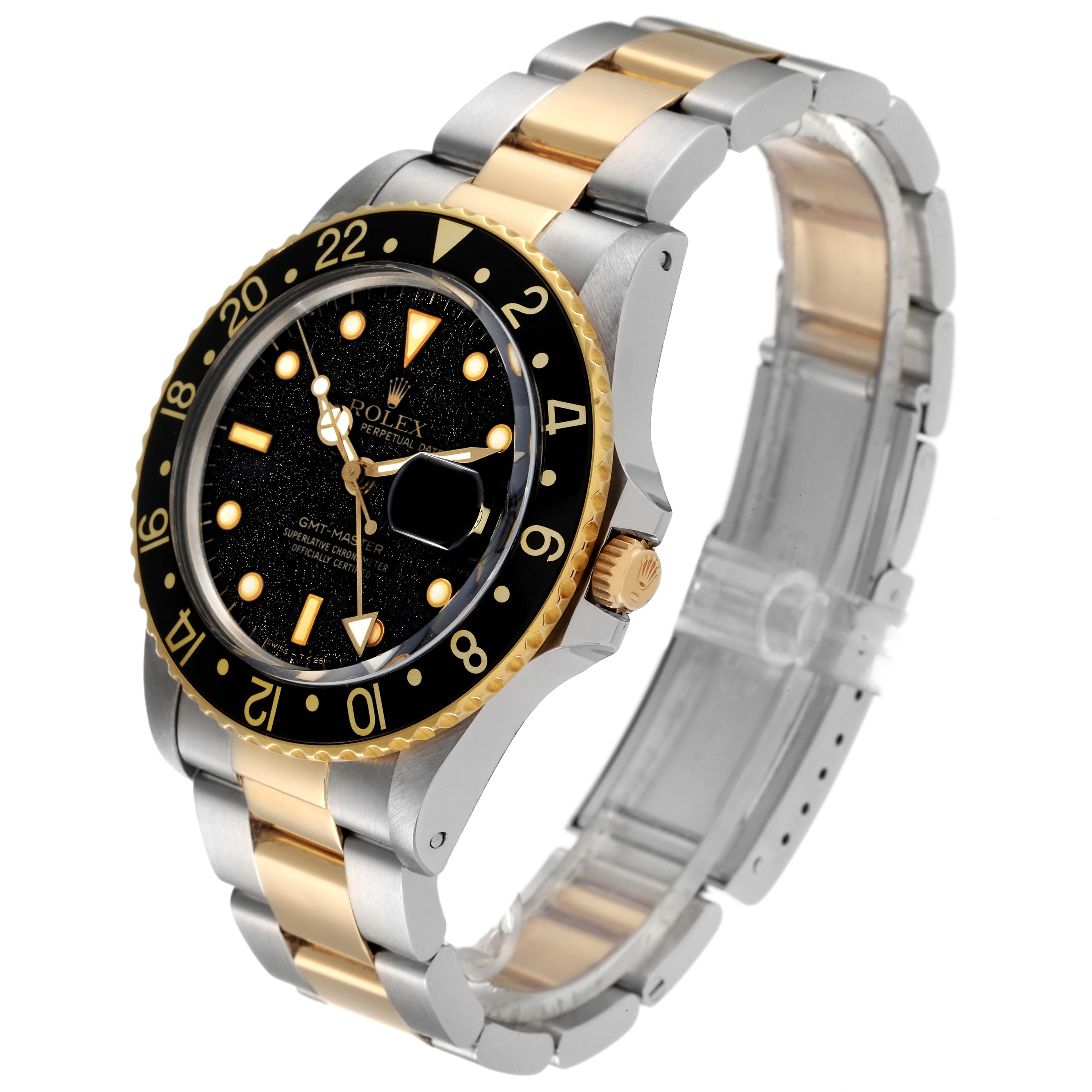 This is a front angled view of the Rolex GMT-Master 16753 Men's Steel and Gold (two tone) Black Dial 16753 Men's Steel and Gold (two tone) Black Dial watch, showing the black dial, bezel, and two-tone bracelet.
