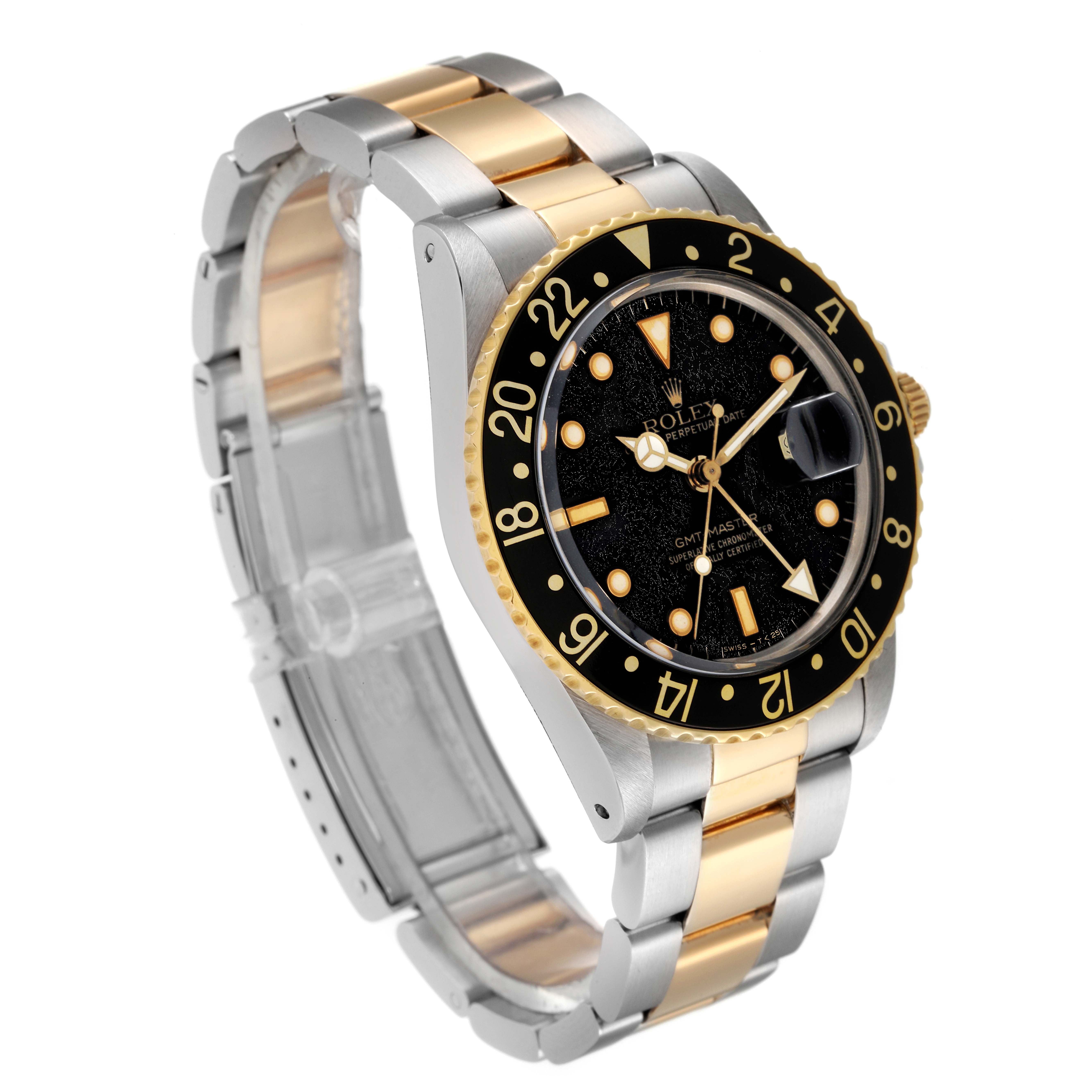 This image shows a Rolex GMT-Master 16753 Men's Steel and Gold (two tone) Black Dial 16753 Men's Steel and Gold (two tone) Black Dial watch at a three-quarter angle, highlighting the face, bezel, and bracelet.