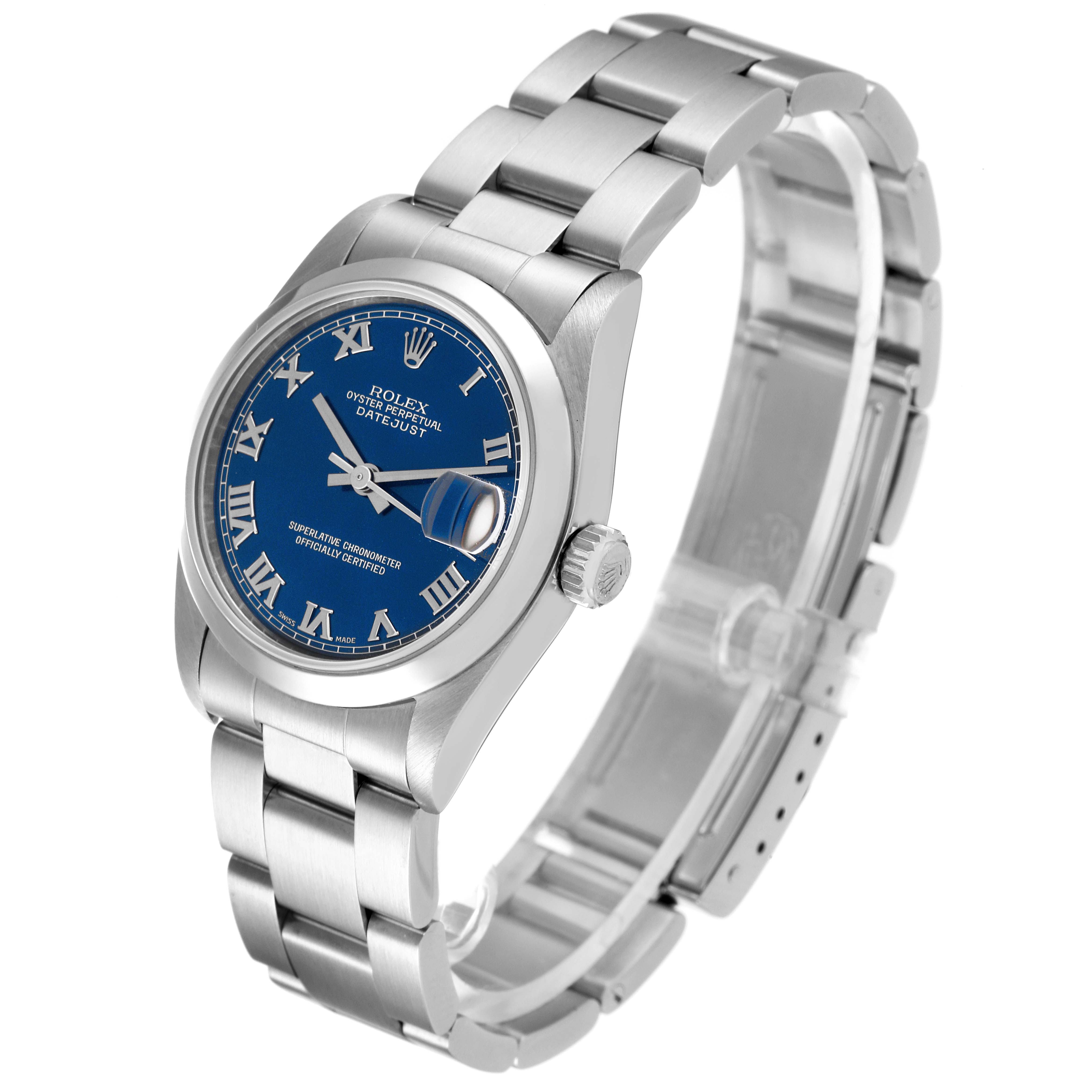 The image shows a side angle view of a Mid-Size Rolex Datejust watch, highlighting the blue dial, bezel, crown, bracelet, and clasp.