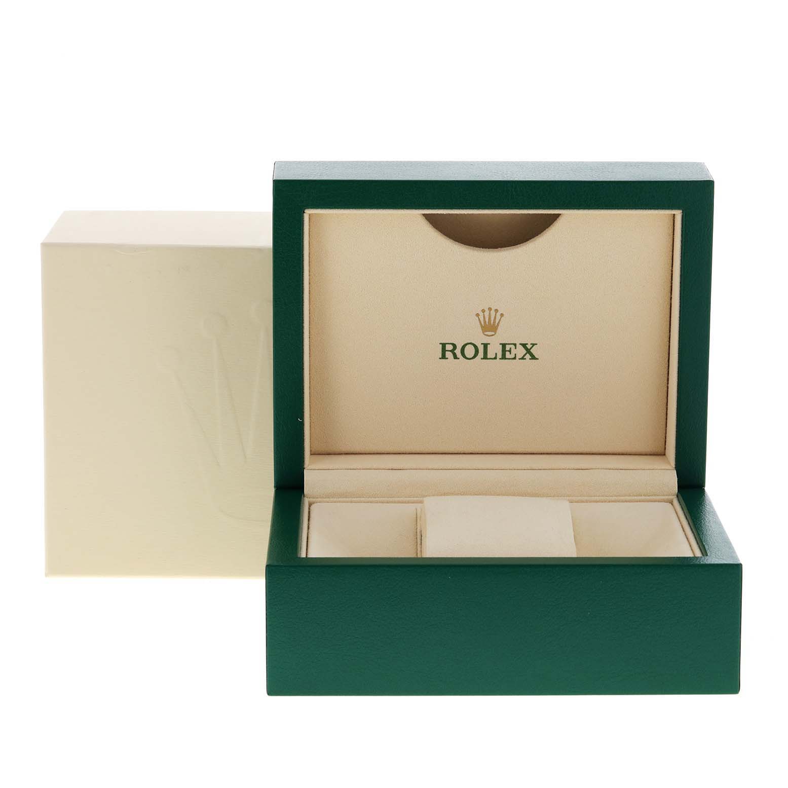 This image shows an open green Rolex watch box for a Mid-Size model, displaying the interior with a compartment and cushion.