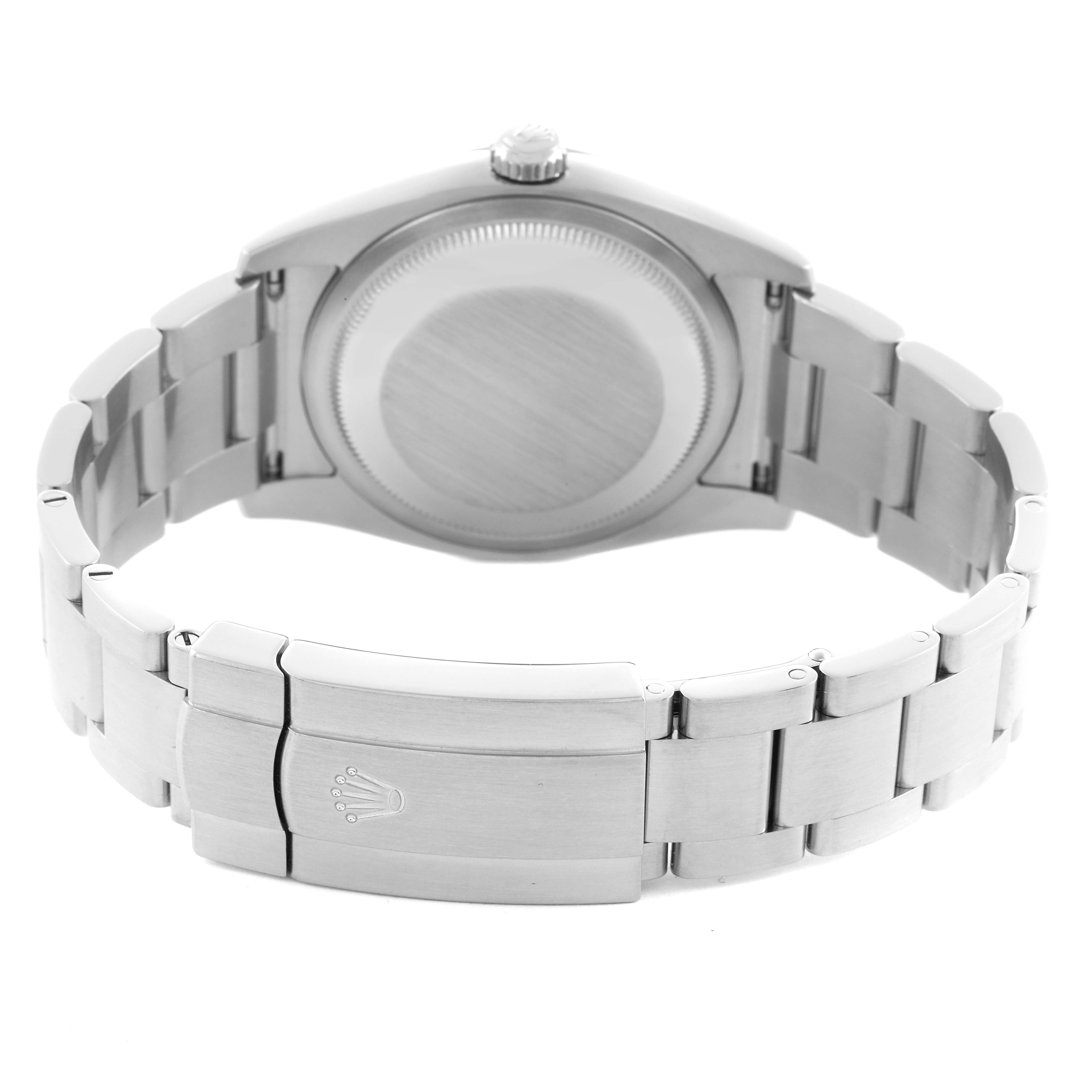 The image shows the back and clasp of a Rolex Oyster Perpetual 116000 Men
s Stainless Steel Black Dial 116000 Men
s Stainless Steel Black Dial watch from a rear angle.