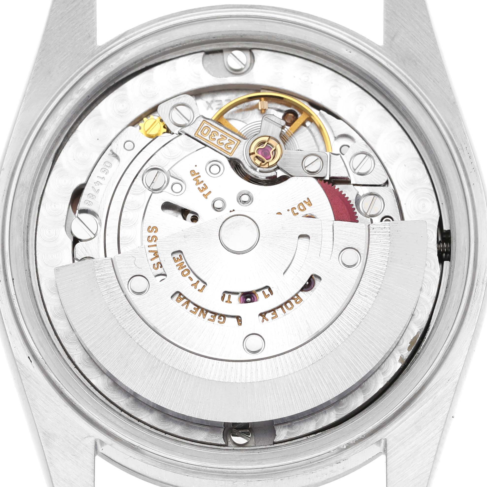 This image shows a close-up of the movement of a Mid-Size Rolex watch, viewed from the rear with the case back removed.