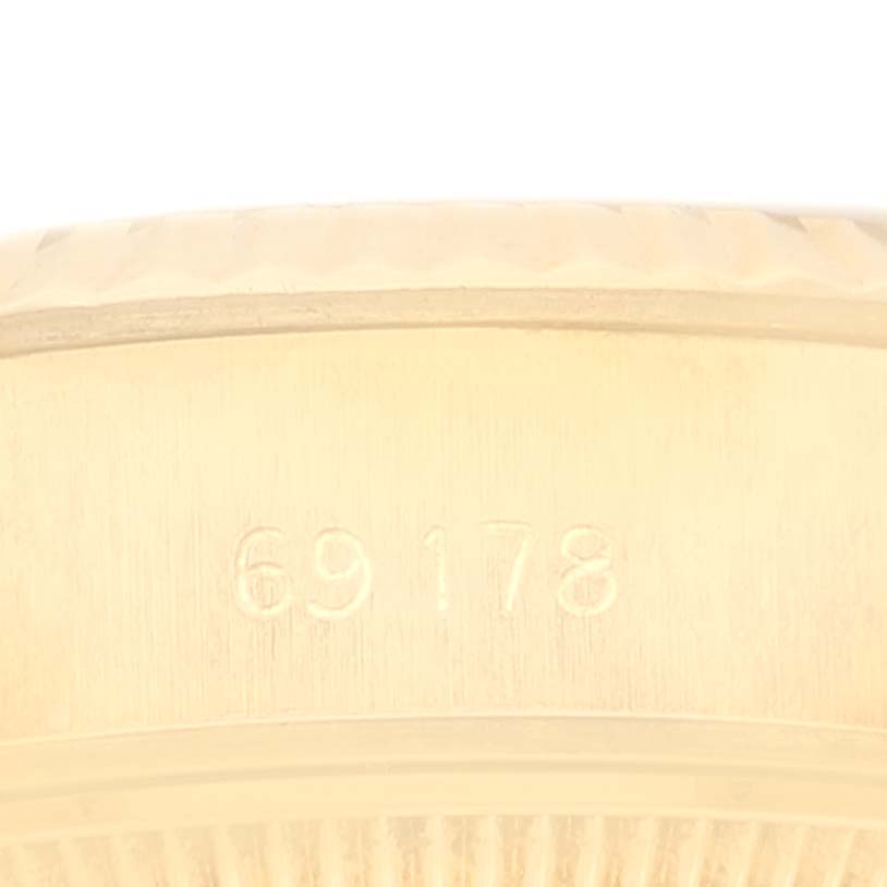 This image shows a close-up side view of the case with the engraved model number 69178 on a Rolex President 69178 Women's Yellow Gold Champagne Dial 69178 Women's Yellow Gold Champagne Dial watch.