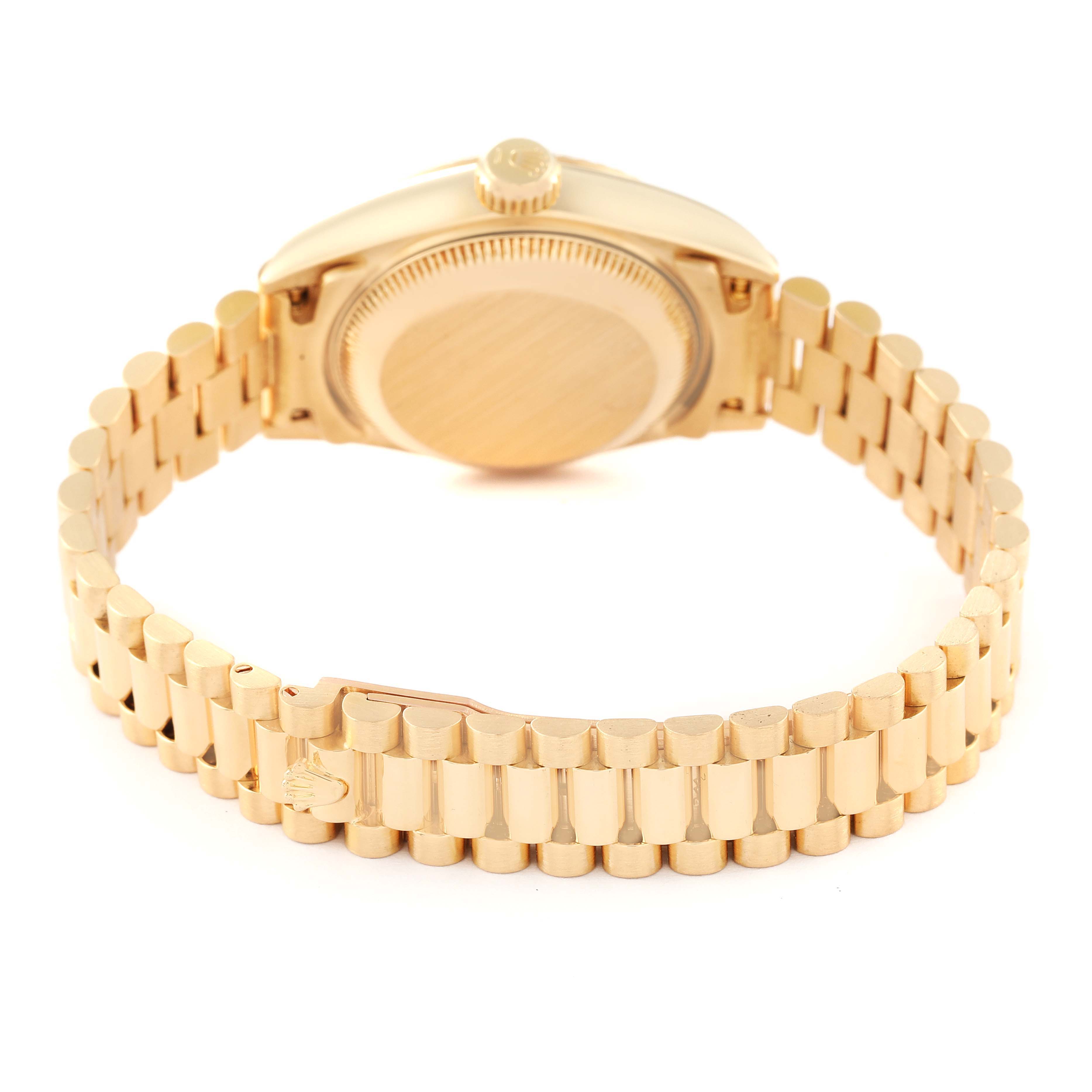 The photo shows the backside, including the case and bracelet, of a Rolex President 69178 Women's Yellow Gold Champagne Dial 69178 Women's Yellow Gold Champagne Dial model watch.