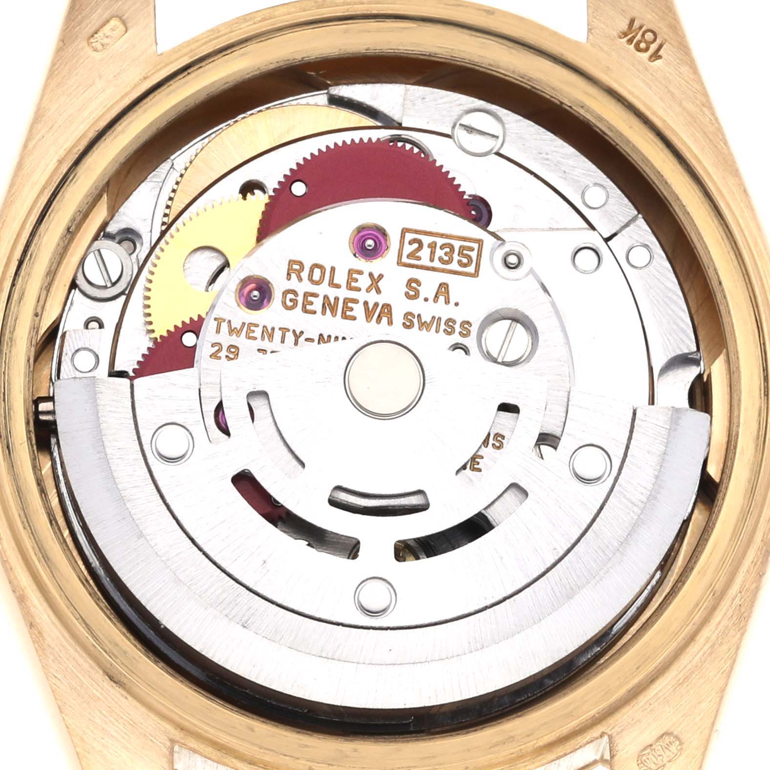 The image shows the Rolex President 69178 Women's Yellow Gold Champagne Dial 69178 Women's Yellow Gold Champagne Dial model's movement from the back, highlighting the gears and rotor.