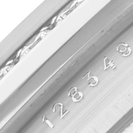 The image shows a close-up of the inner bezel with engraved numbers on the Rolex President 128349 Men's White Gold Mother of Pearl Dial 128349 Men's White Gold Mother of Pearl Dial watch.