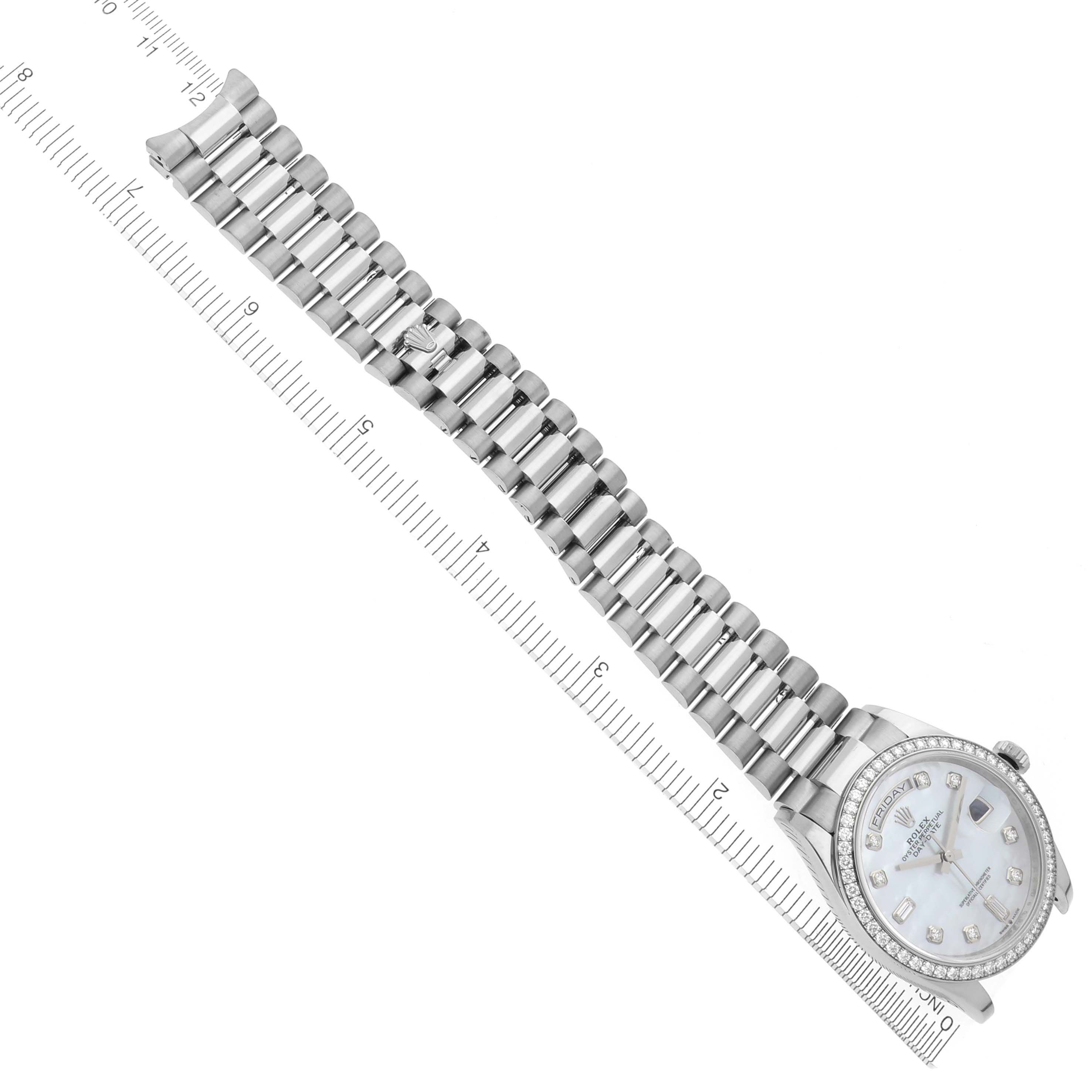 The Rolex President 128349 Men's White Gold Mother of Pearl Dial 128349 Men's White Gold Mother of Pearl Dial watch is shown from a top-down angle, displaying the full band and face.