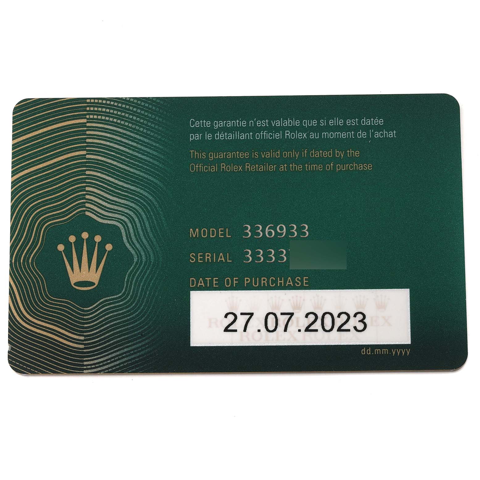 This image shows a warranty card for the Rolex Sky-Dweller 336933 Men's Steel and Gold (two tone) Black Dial 336933 Men's Steel and Gold (two tone) Black Dial watch model.