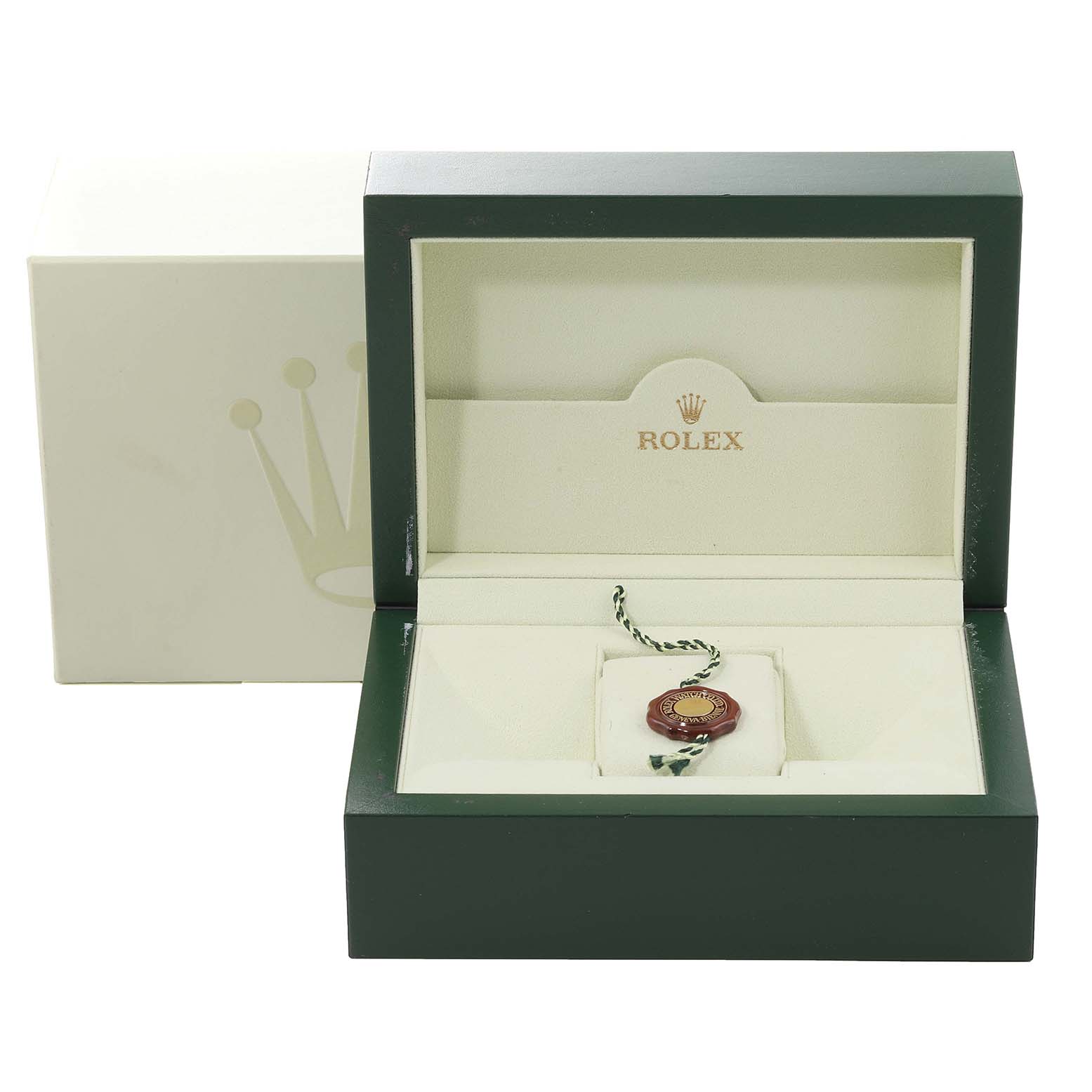 This image shows an open Rolex Submariner 16610 Men's Stainless Steel Black Dial 16610 Men's Stainless Steel Black Dial watch box, revealing the interior and a Rolex tag.