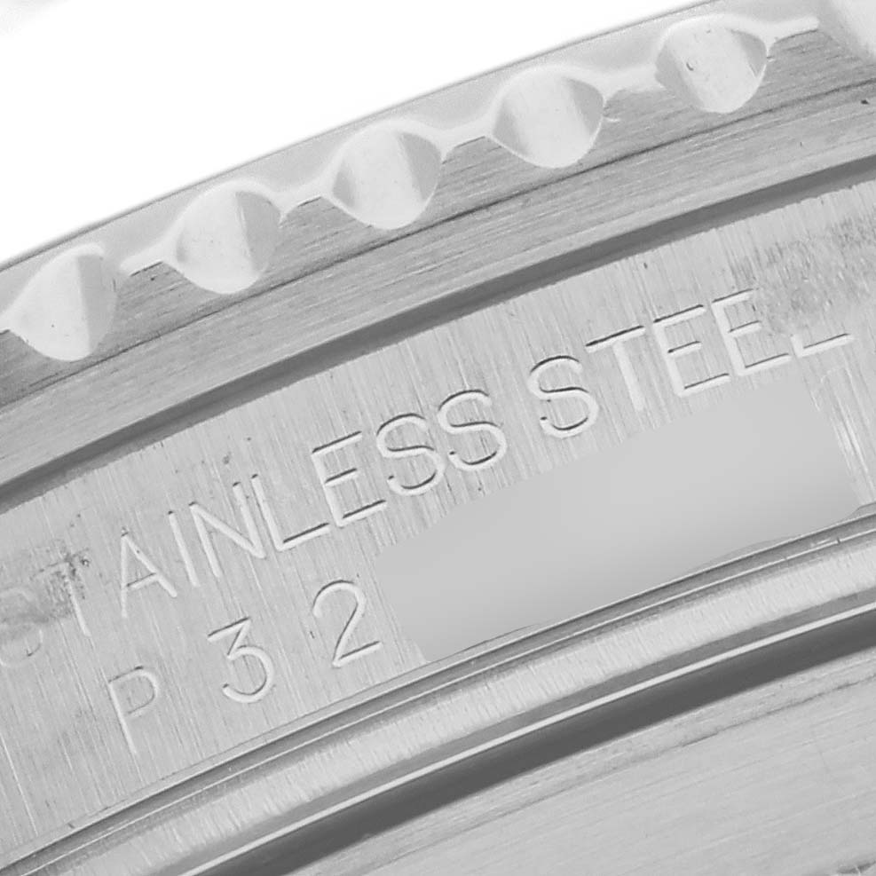 The image shows a close-up of the bezel and engraved details on the stainless steel Rolex Submariner 16610 Men
s Stainless Steel Black Dial 16610 Men
s Stainless Steel Black Dial.