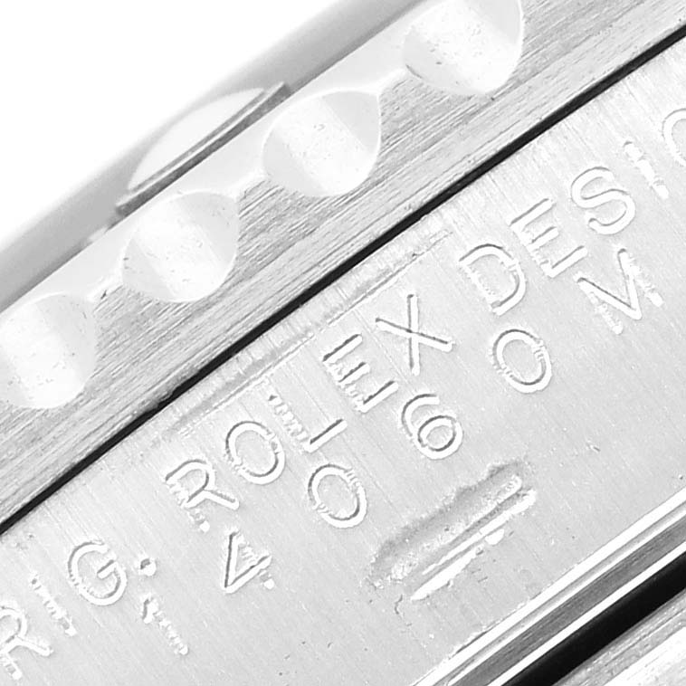 Close-up of the side engraving and bezel of a Rolex Submariner 14060 Men
s Stainless Steel Black Dial 14060 Men
s Stainless Steel Black Dial watch, showcasing its detailed craftsmanship.