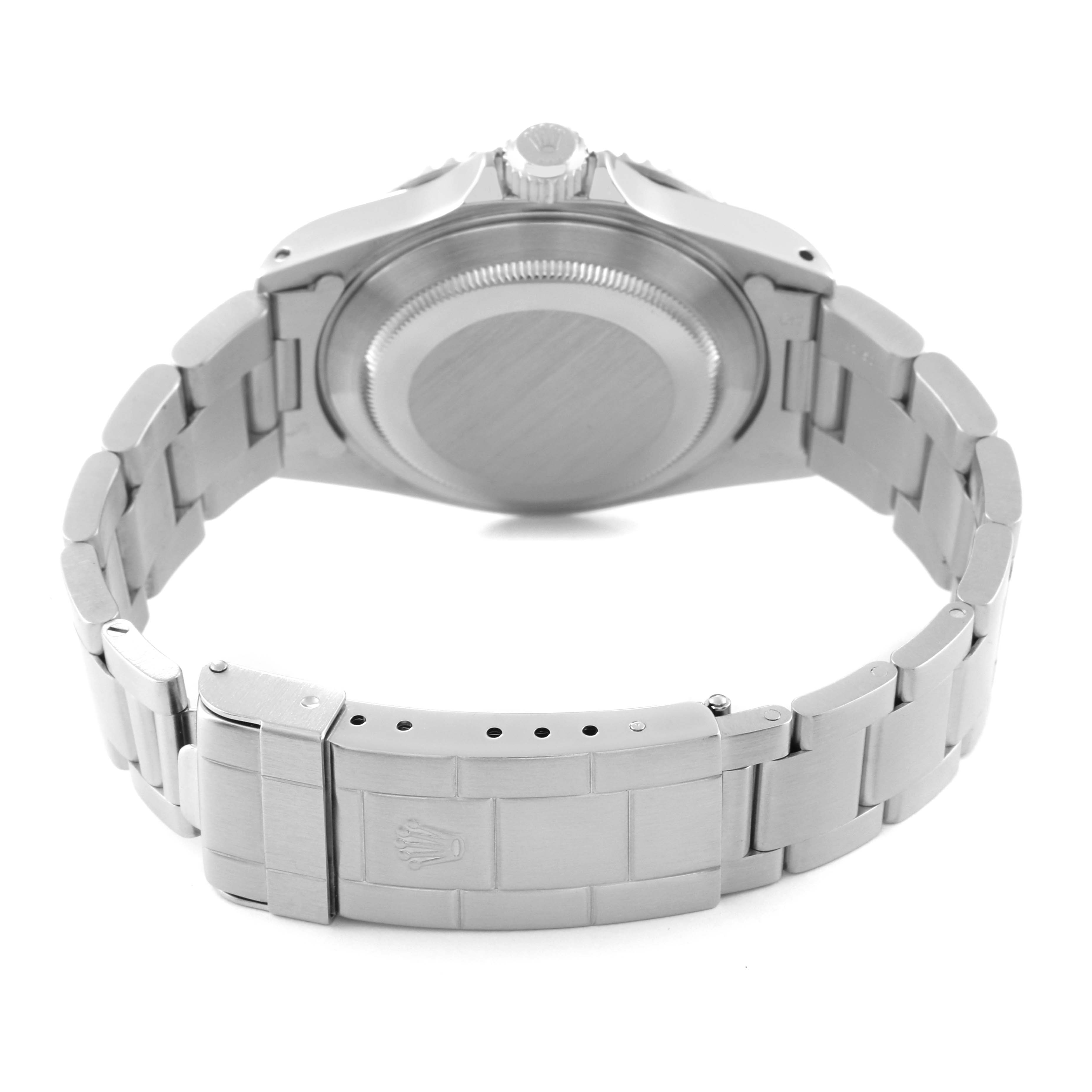 The Rolex Submariner 14060 Men
s Stainless Steel Black Dial 14060 Men
s Stainless Steel Black Dial watch is shown from the rear, displaying the case back and bracelet with the clasp open.