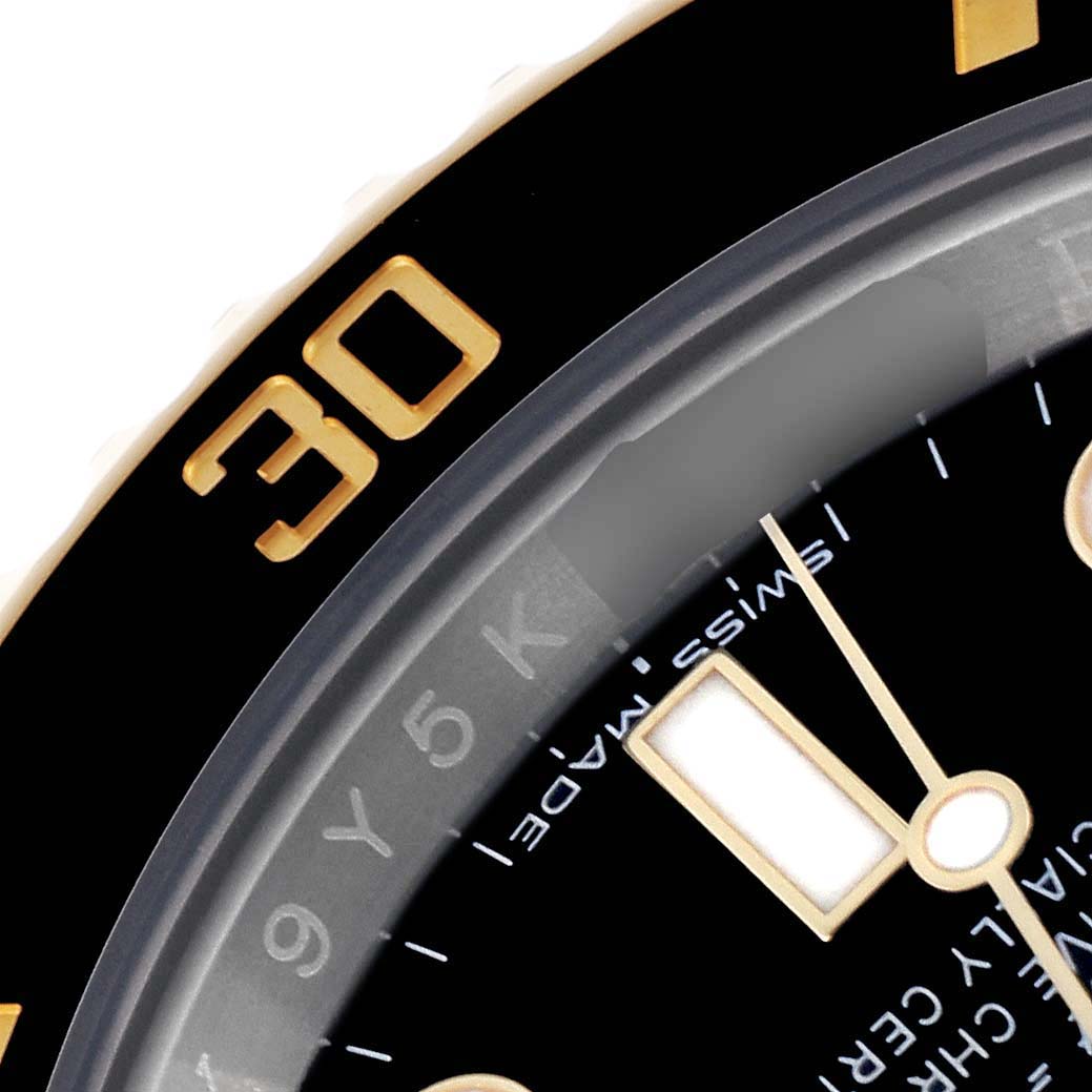 The image shows a close-up of the bezel and dial of a Rolex Submariner 116613 Men's Steel and Gold (two tone) Black Dial 116613 Men's Steel and Gold (two tone) Black Dial watch, highlighting the "30" marker and part of the dial.