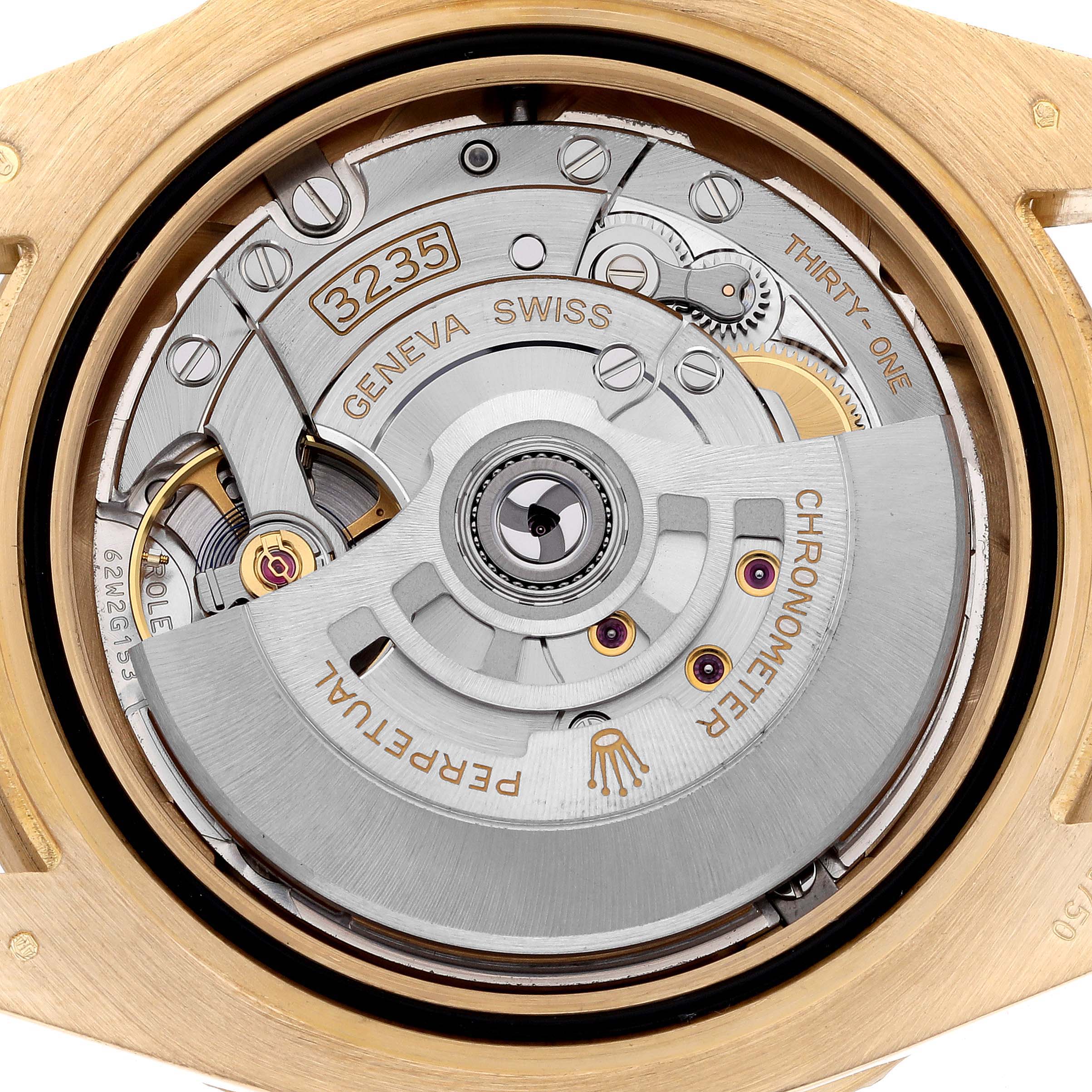 The image shows the movement of a Rolex Submariner 126618LB Men's Yellow Gold Blue Dial 126618LB Men's Yellow Gold Blue Dial, displaying intricate gears and the rotor with "3235" marking.