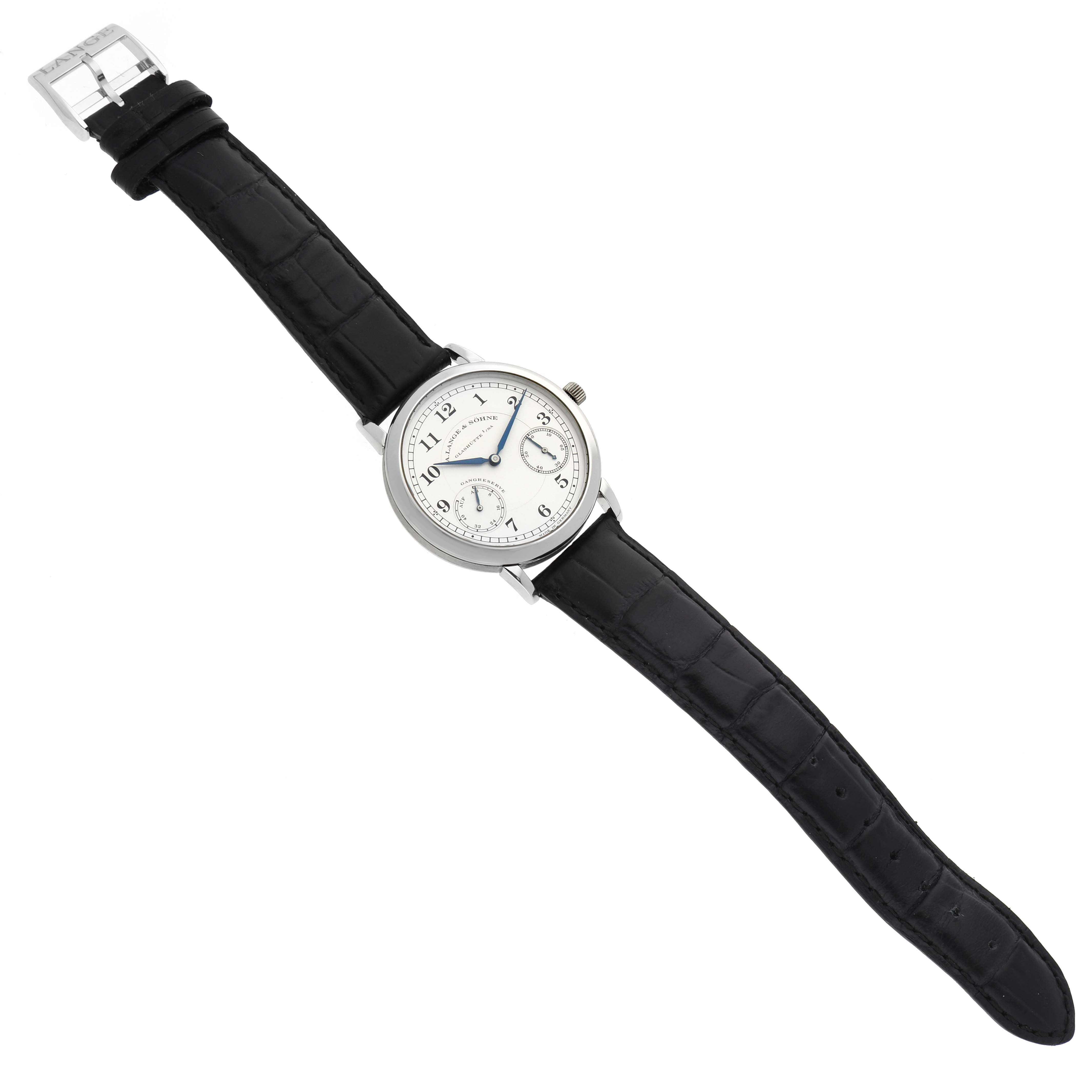 The A. Lange & Sohne 1815 221.025 Men's Platinum Silver Dial watch is shown from a top-down angle, highlighting the face, hands, and black leather strap.