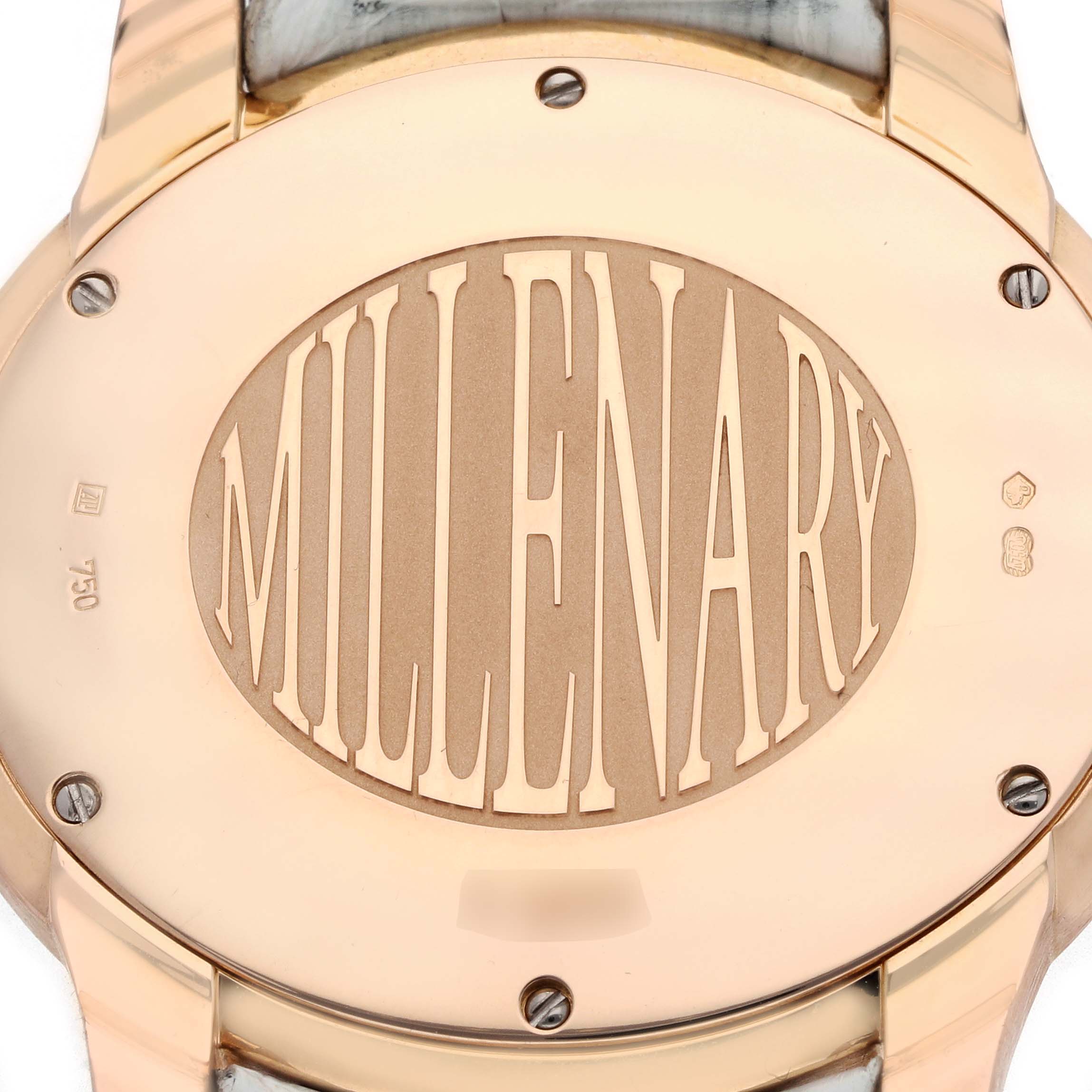 The image shows the back case of the Audemars Piguet Millenary 77301OR Women's Rose Gold Silver Dial, highlighting its engraved logo.