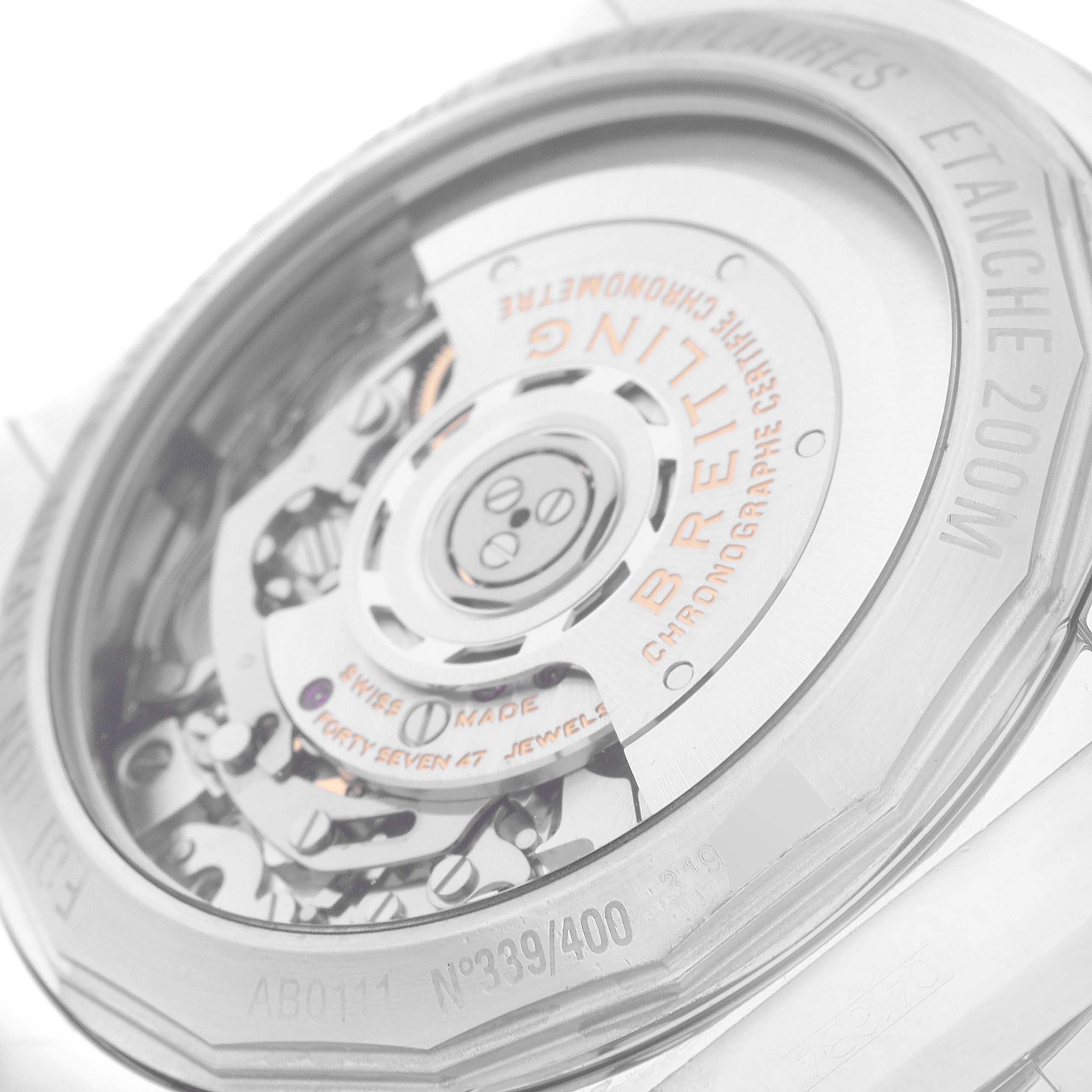 The image shows the back view of the Breitling Chronomat AB01116X/BE67 Men's Stainless Steel Mother of Pearl Dial AB01116X/BE67 Men's Stainless Steel Mother of Pearl Dial watch, revealing its internal mechanism and casing details.