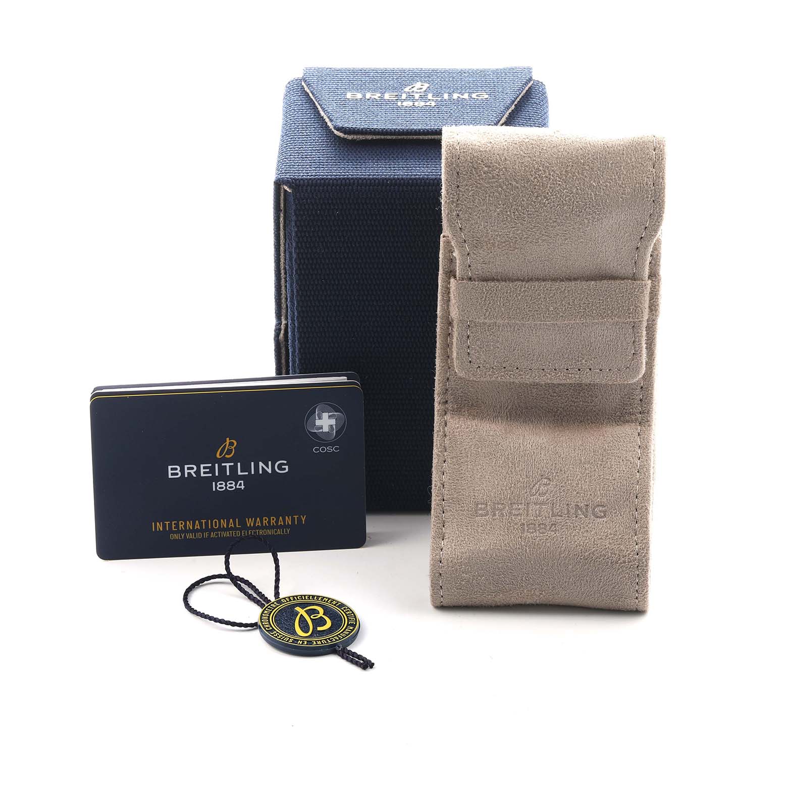 The image shows a Breitling Navitimer AB0137 Men's Stainless Steel Blue Dial watch box, travel pouch, warranty card, and hang tag from a front angle.