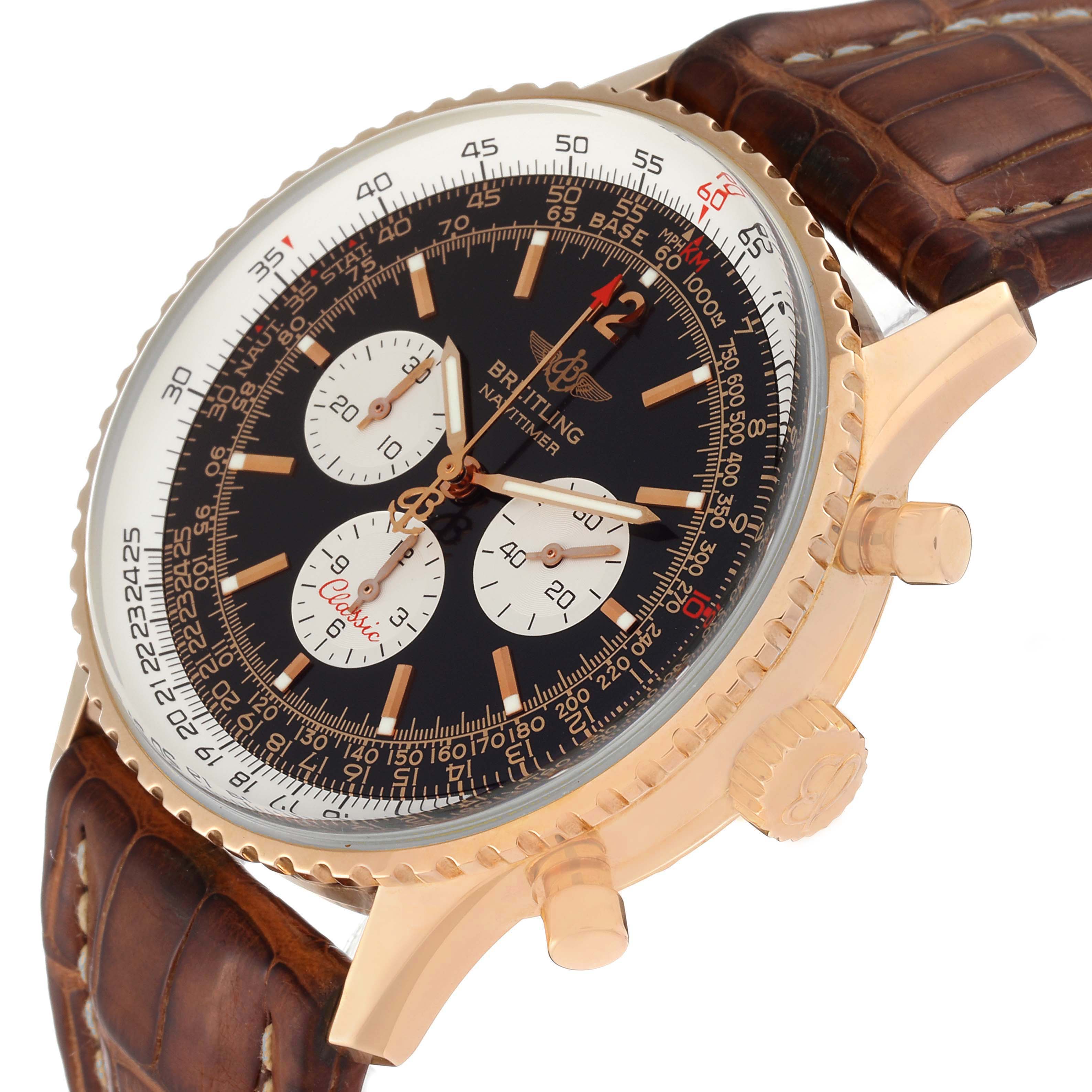 The Breitling Navitimer model H30330 watch is shown at an angled view, highlighting its round case, black dial with subdials, gold-tone markers, and brown leather strap.