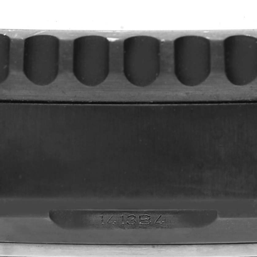 The image shows a close-up of a toothed bezel edge and part number 1413B4 on a Breitling Navitimer MB0210 Men
s Stainless Steel Black Dial MB0210 Men
s Stainless Steel Black Dial watch.