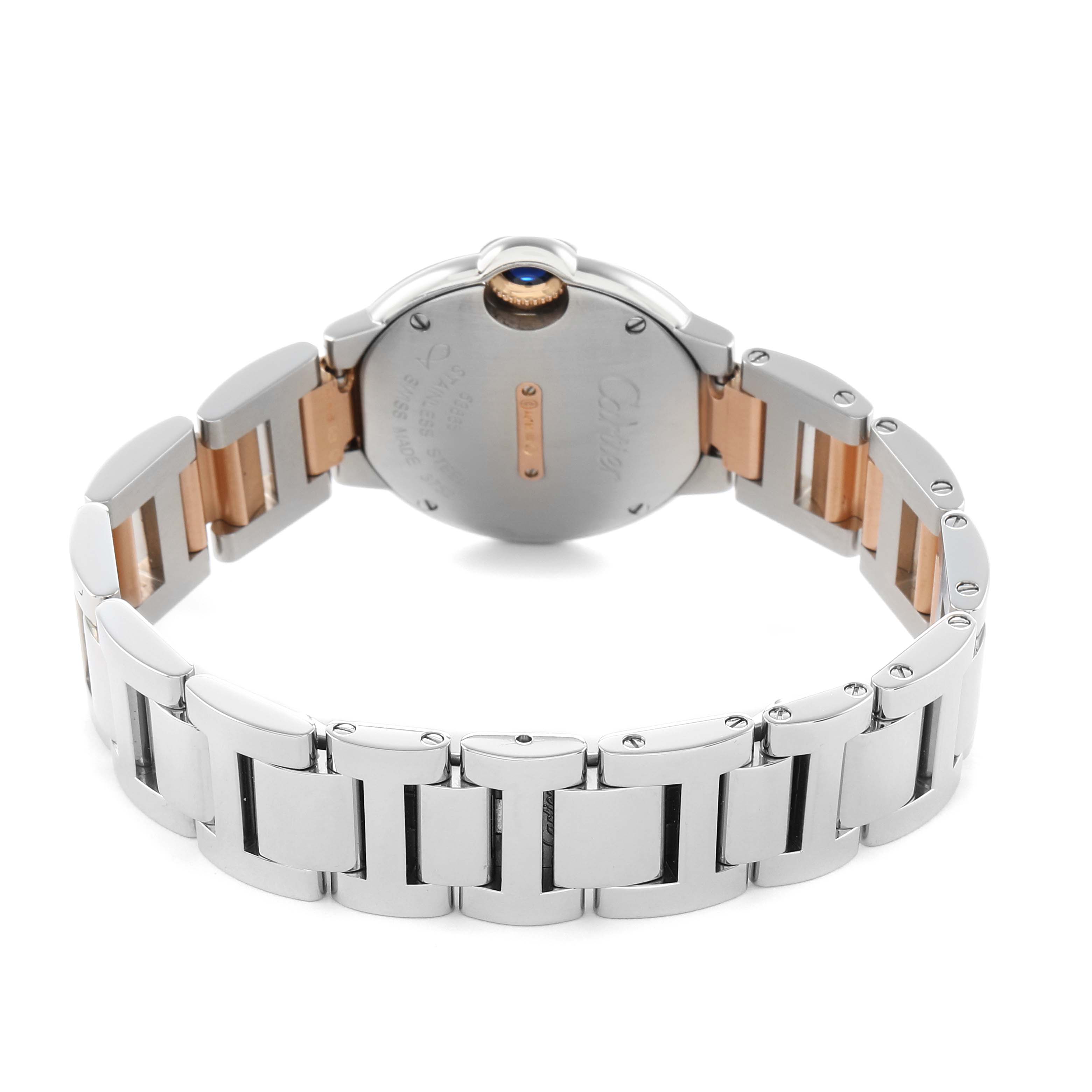 The image shows the back side of a Cartier Ballon Bleu W3BB0005 Women's Steel and Gold (two tone) Silver Dial watch, highlighting the metal bracelet and case back.