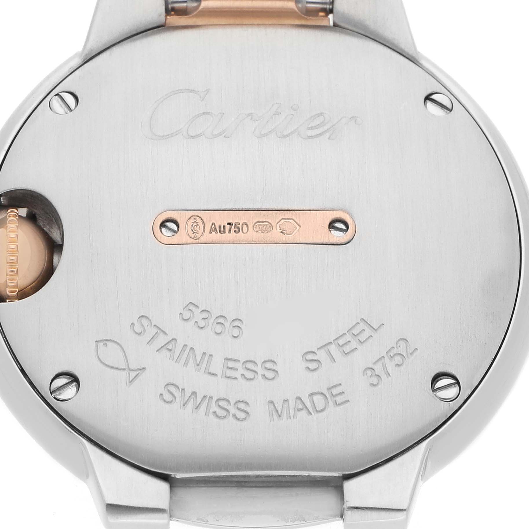 The image shows the case back of a Cartier Ballon Bleu W3BB0005 Women's Steel and Gold (two tone) Silver Dial watch with engravings and screws visible.
