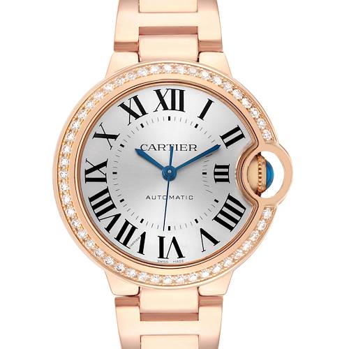The Cartier Ballon Bleu WJBB0036 Women's Rose Gold Silver Dial watch is shown from the front, highlighting its face, bezel with diamonds, and integrated bracelet.